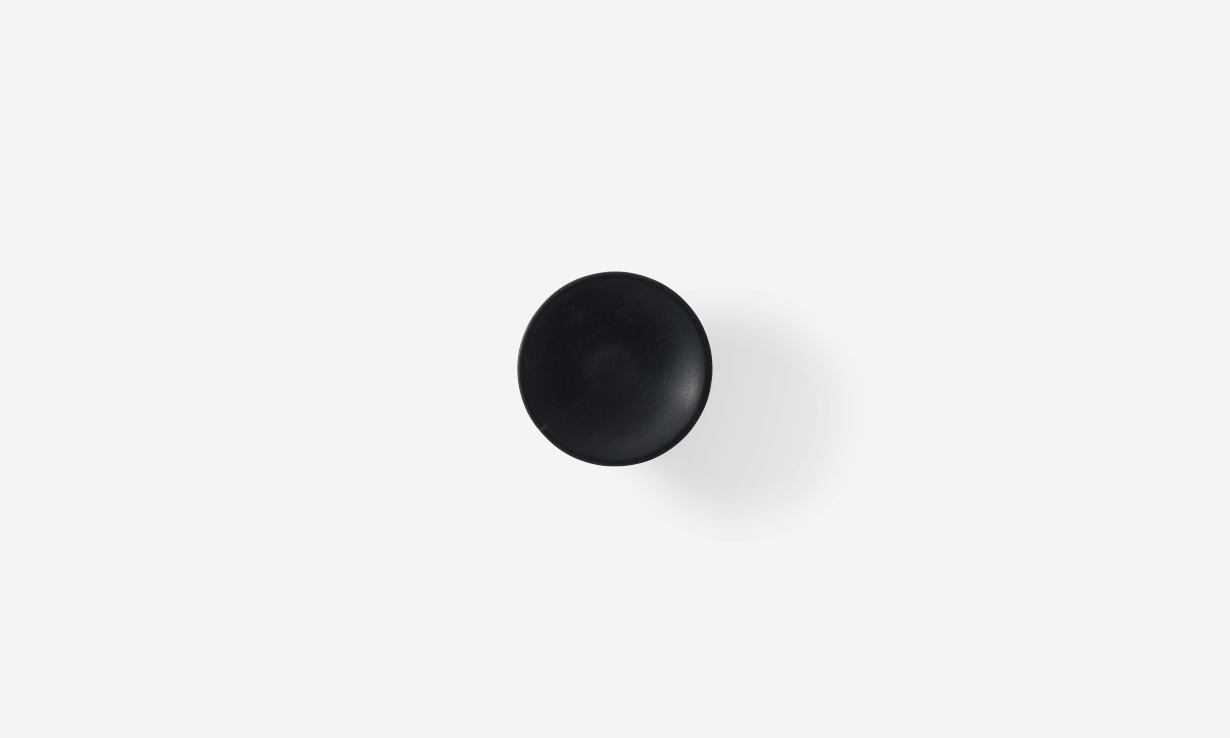 Front view of medium black marble coat hook