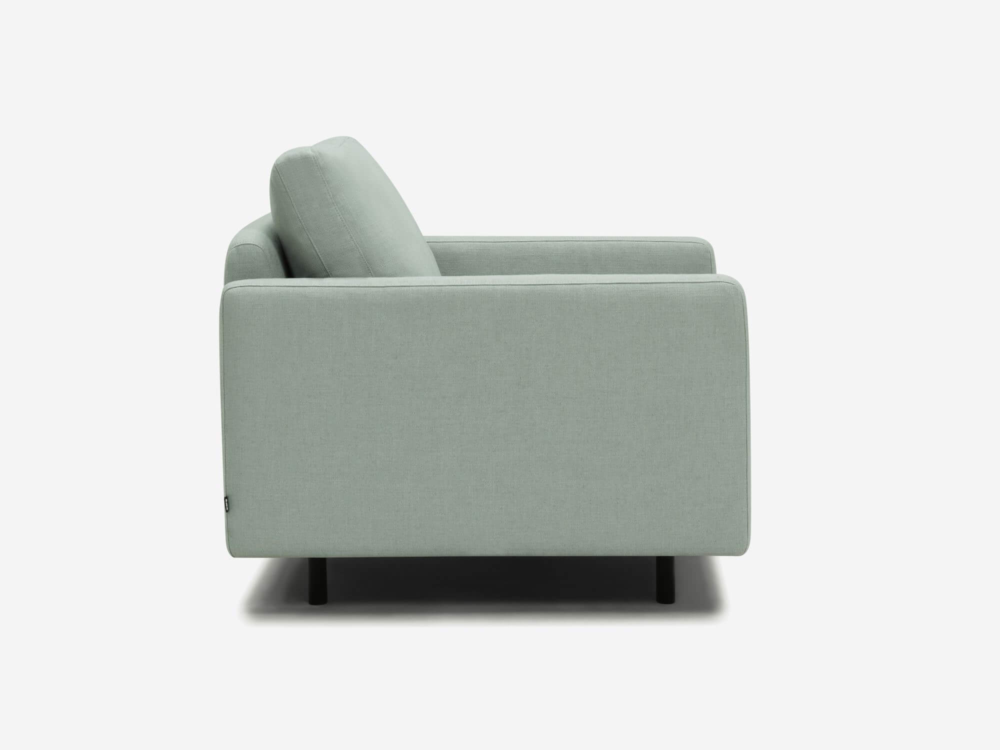 Side view of teal armchair