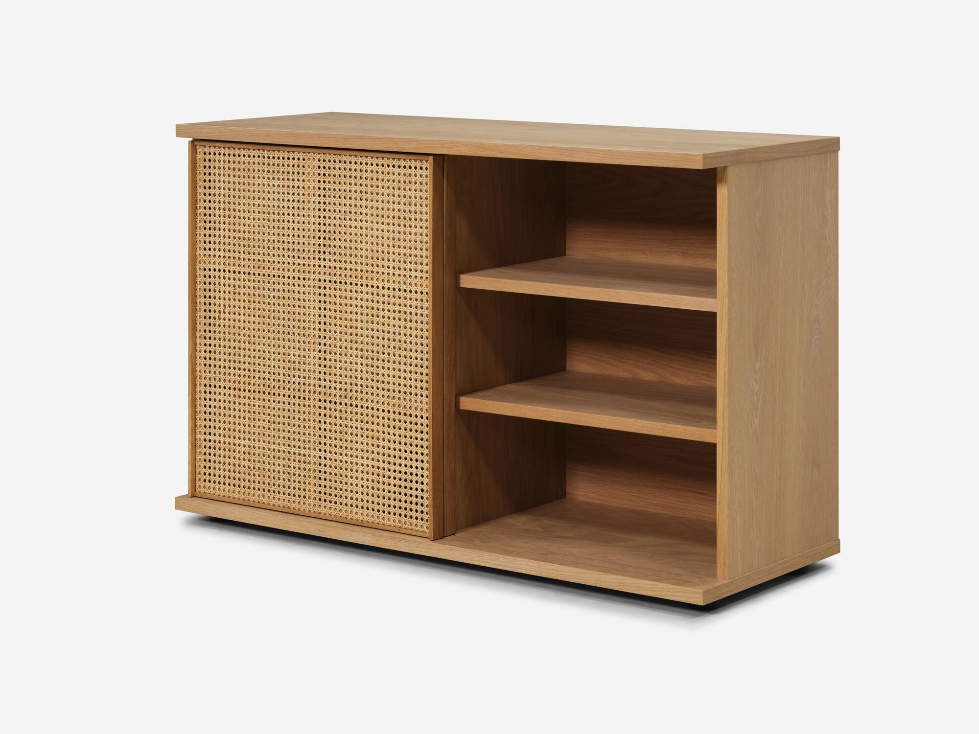 Front angle view of small oak office cabinet with cane screens on left