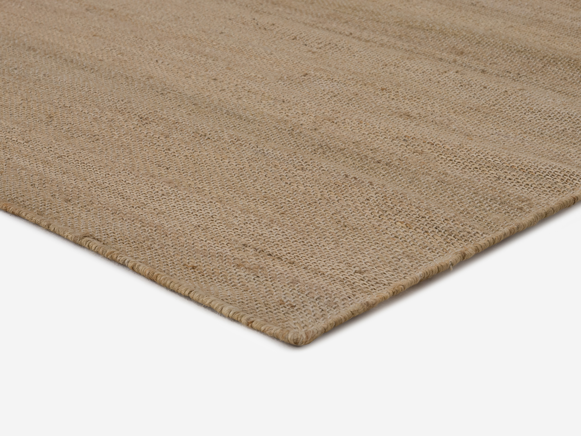 Hand woven jute large rug corner view