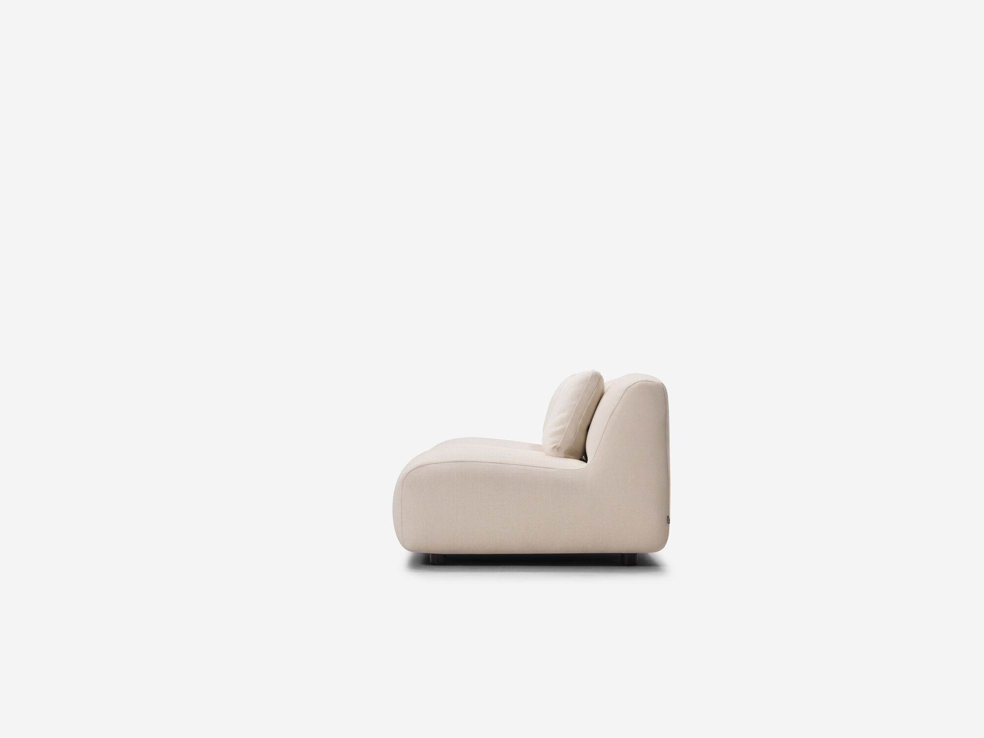 Beige armless loveseat left side view