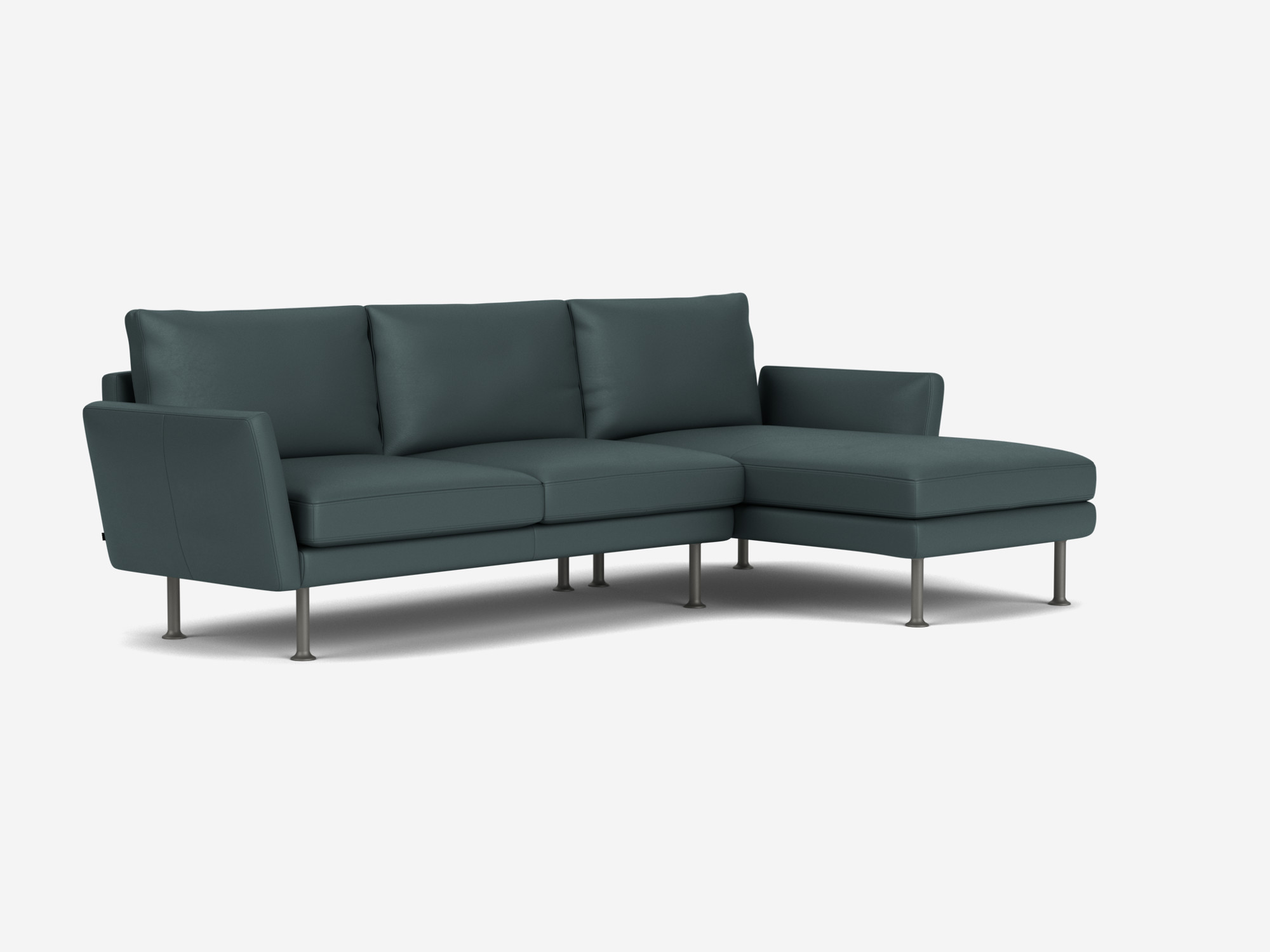 Blue leather sectional sofa with low arms and right facing chaise front angle view