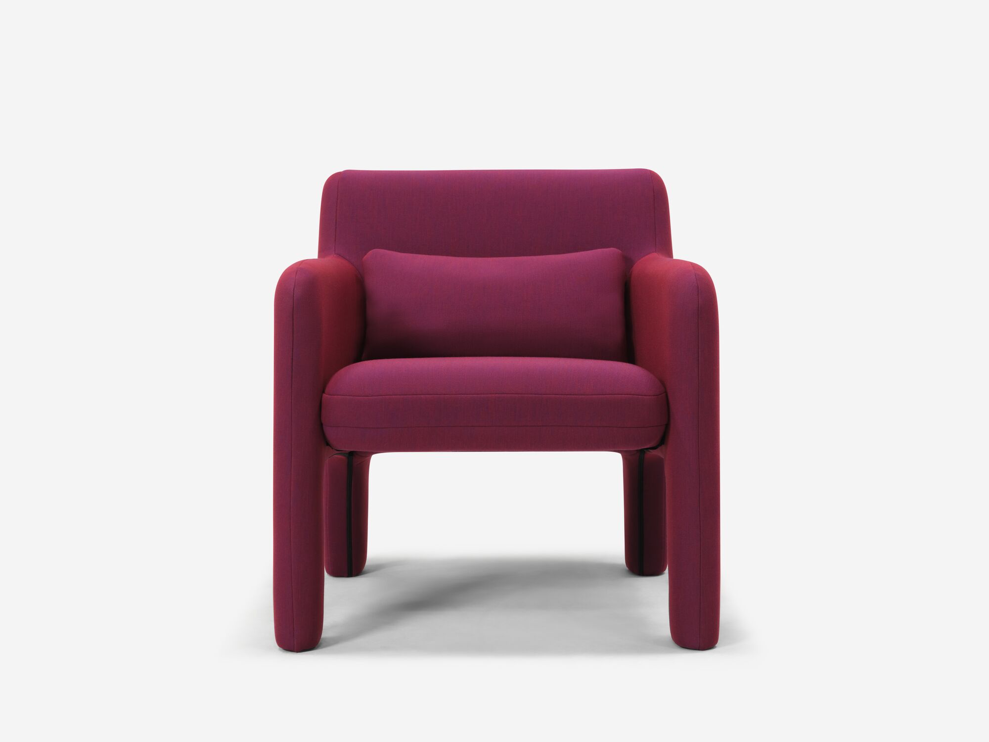 Front view of organic shaped red armchair