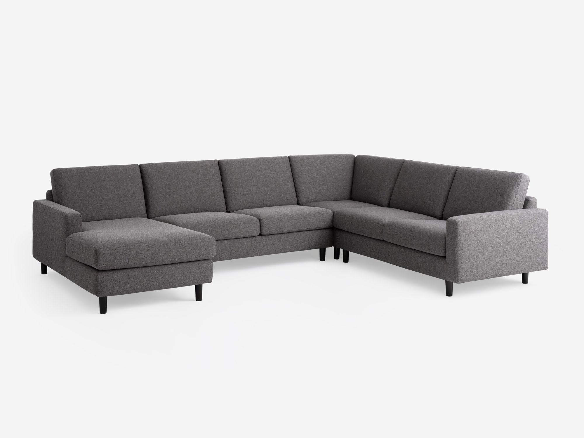 Angled view of the Oskar 4-piece modern sectional in grey fabric
