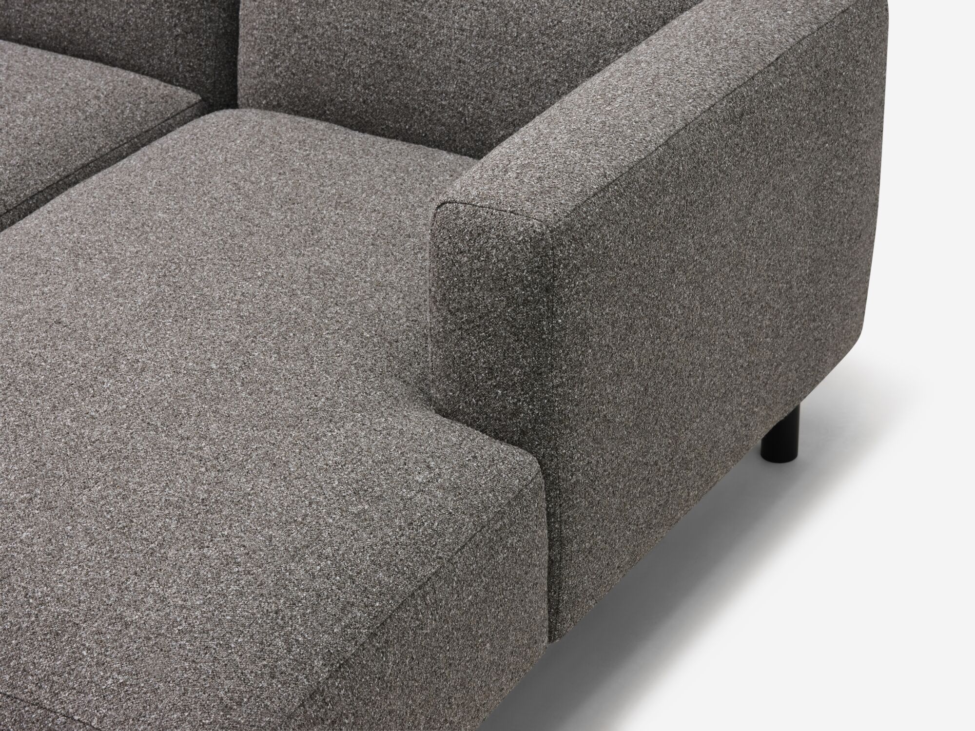 Dark grey sectional seat detail view