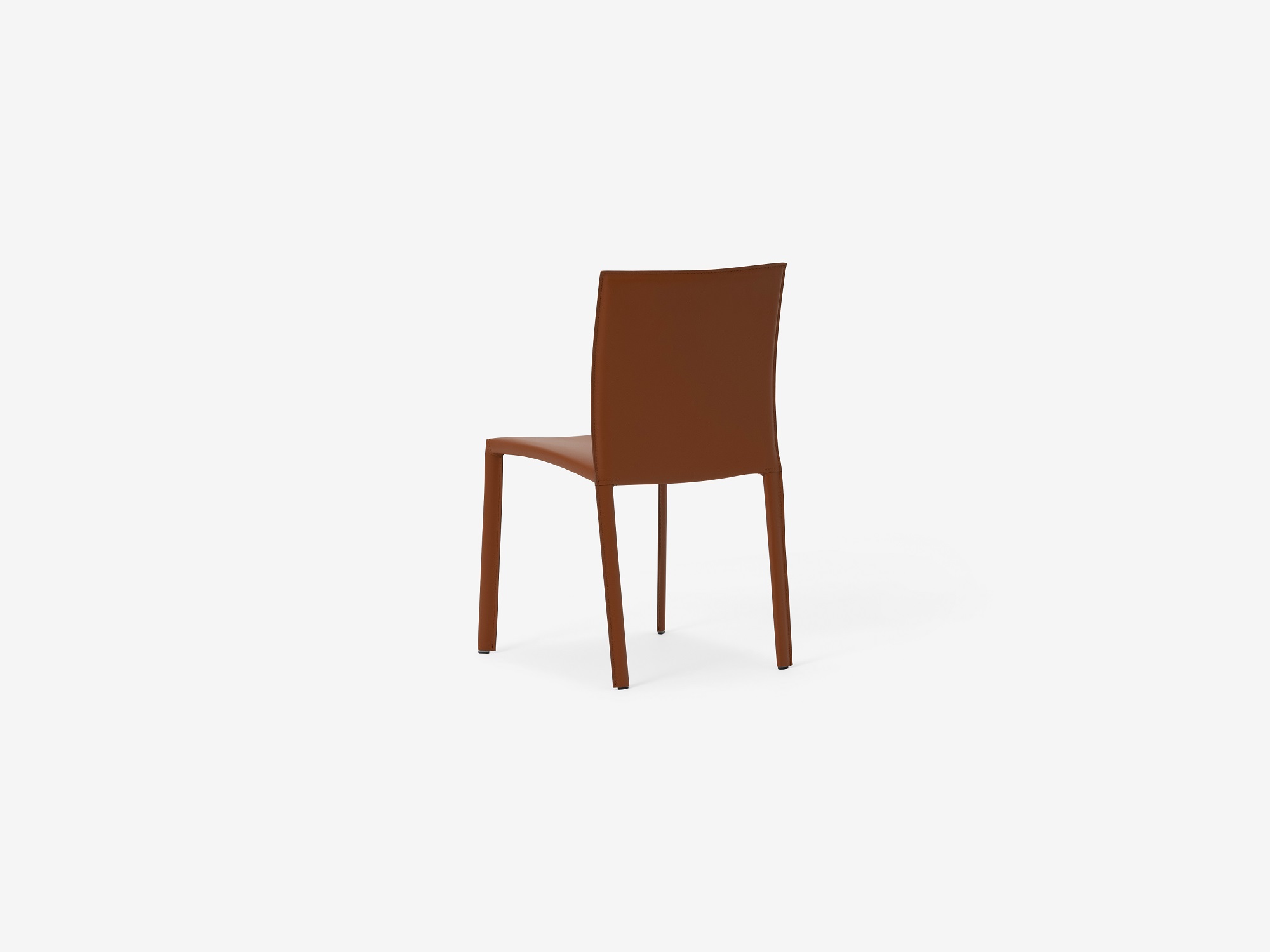 Back angled view of the Acel Mid Century Dining Chair in brown leather