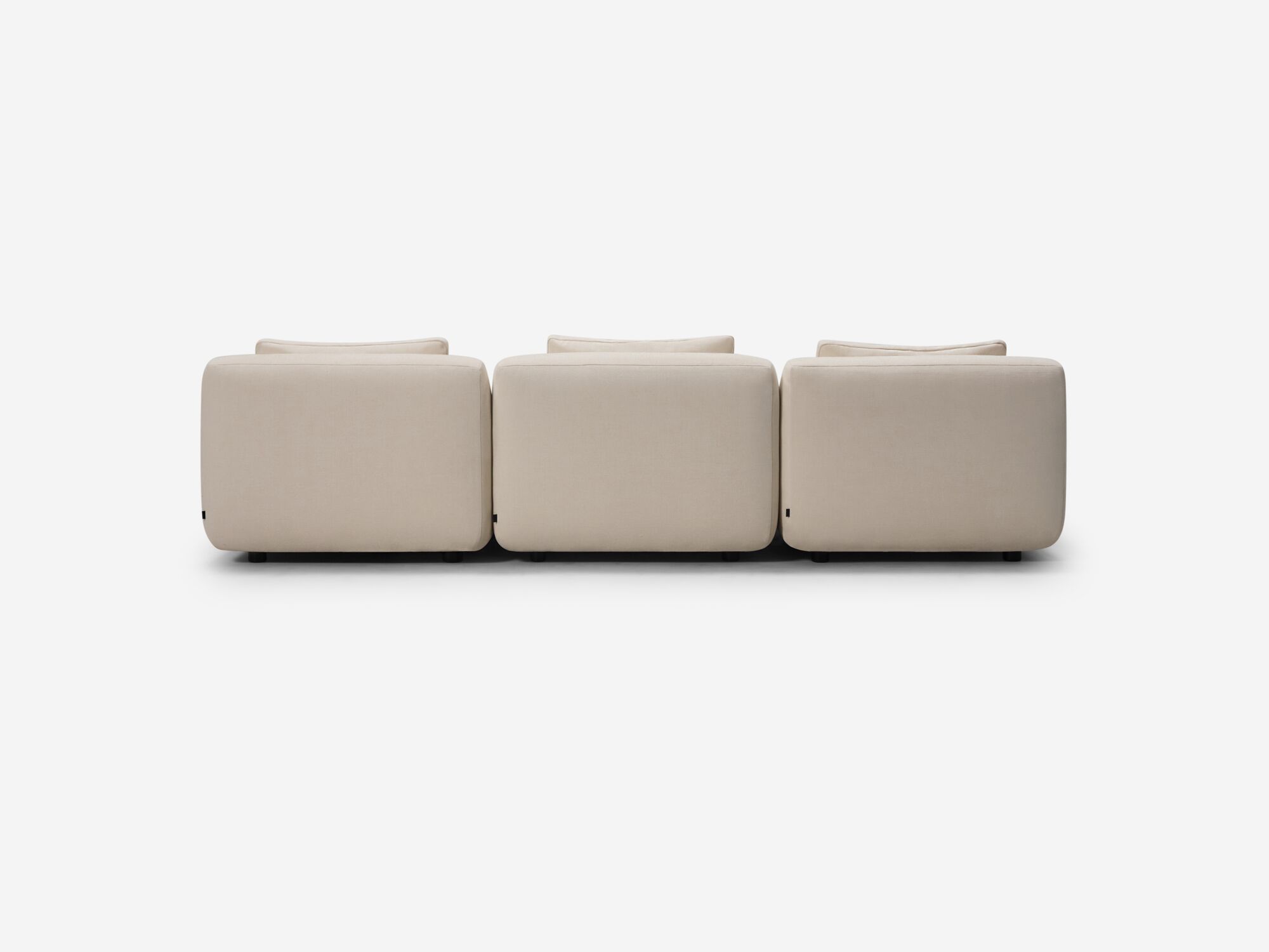 Back view of beige armless sectional