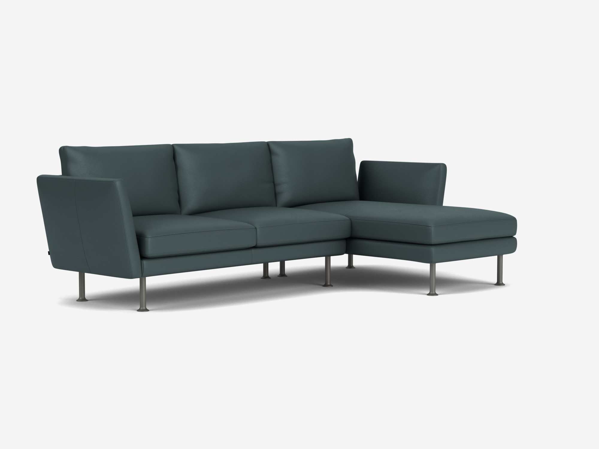 Front angle view of blue leather sectional sofa with high arms and right facing chaise