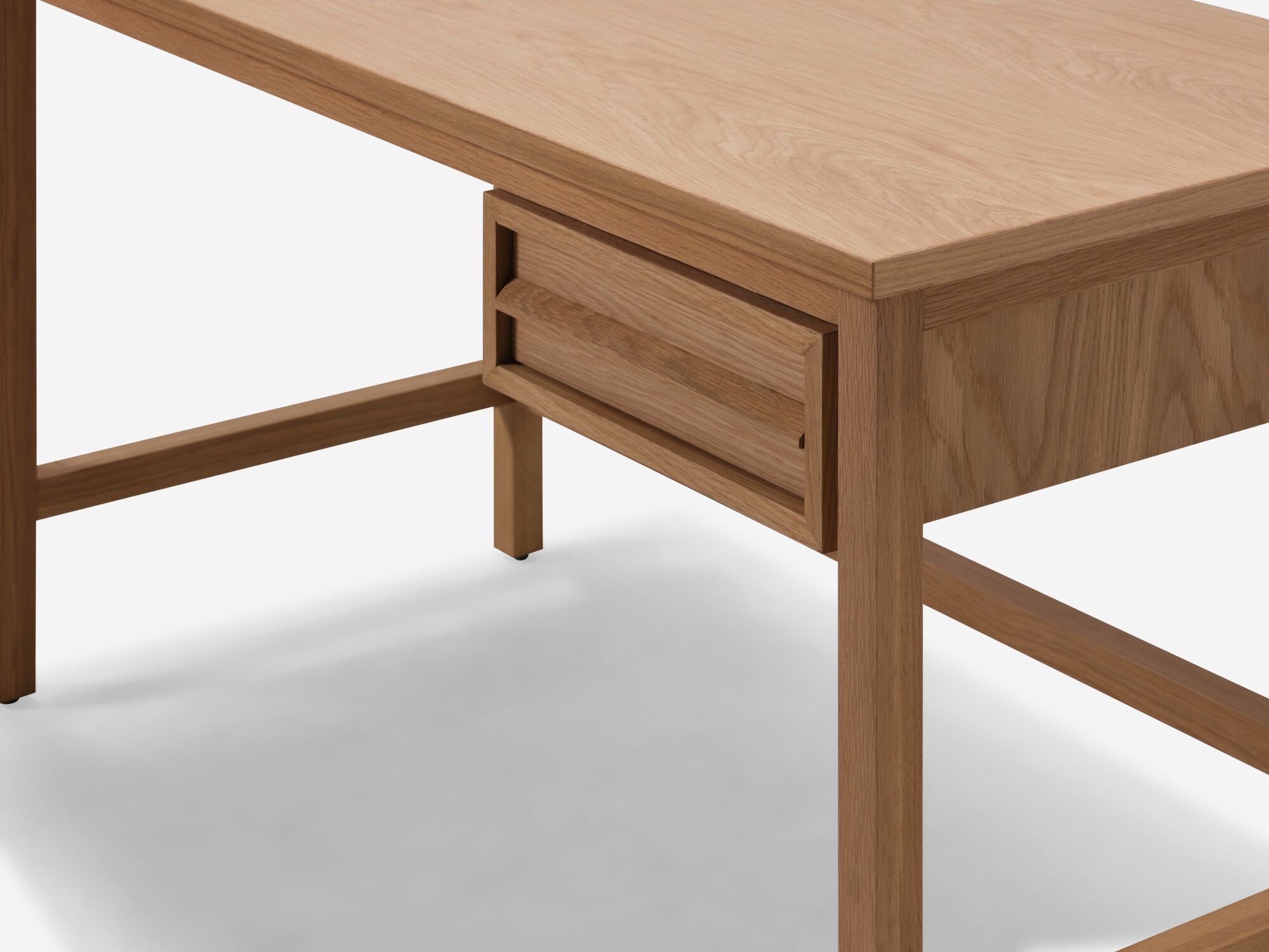 Detail view of oak desk with drawer