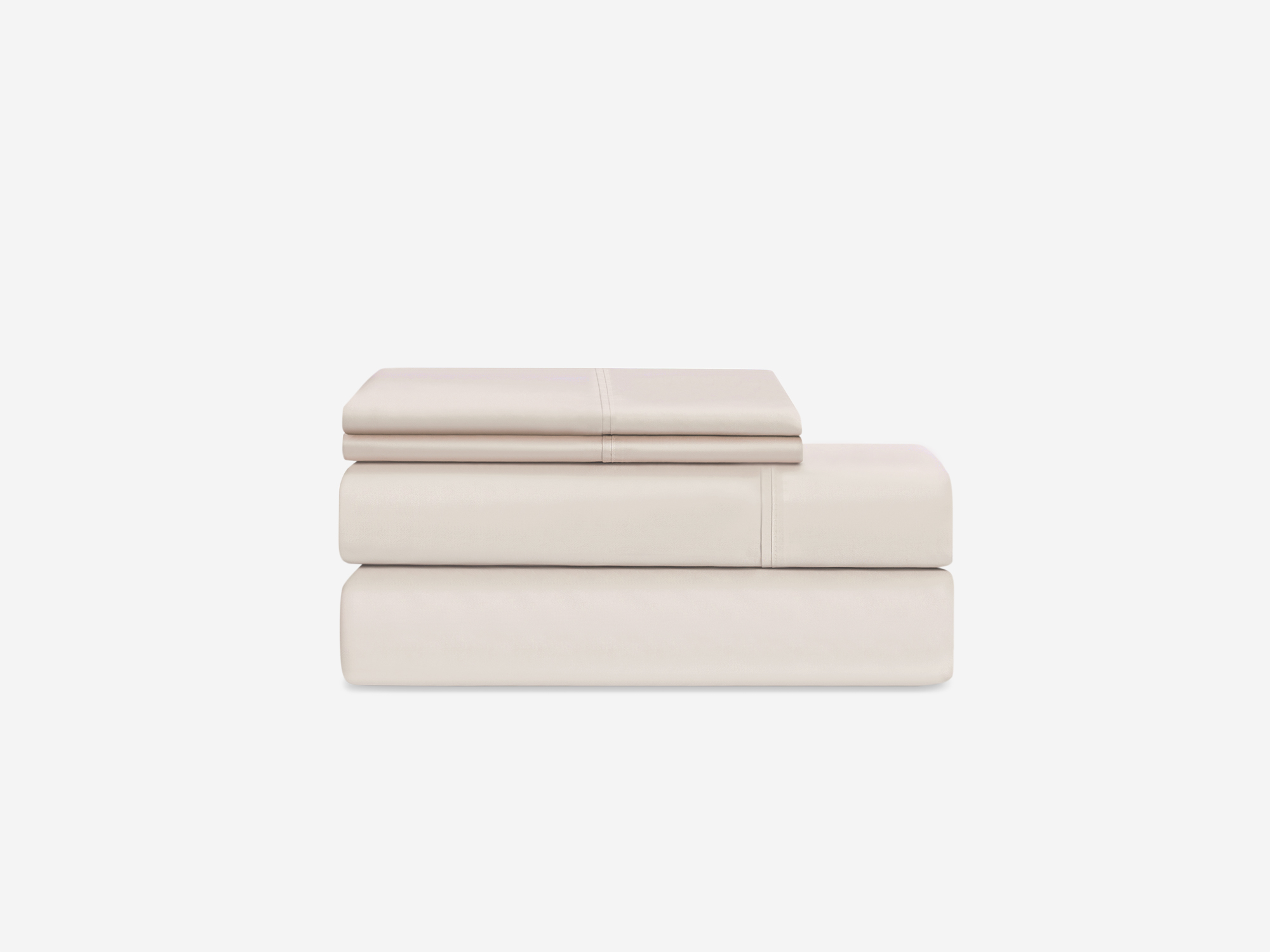 Side view of organic cotton bed sheets in off white