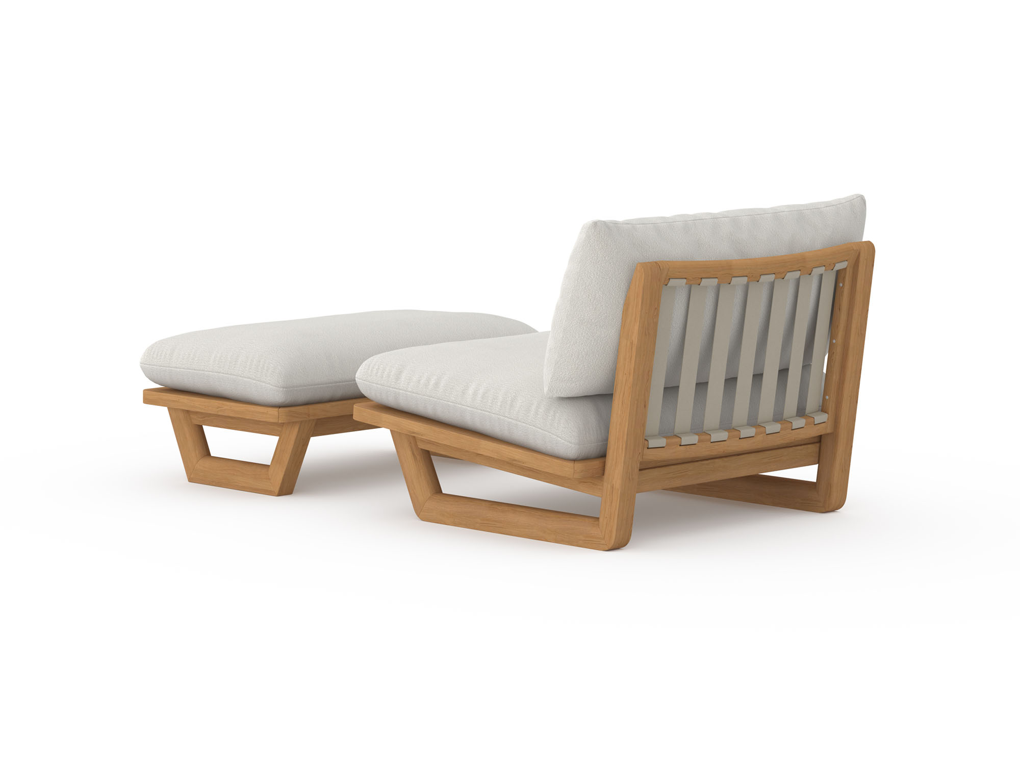 Back view of outdoor lounge chair and ottoman with white cushions and wood legs