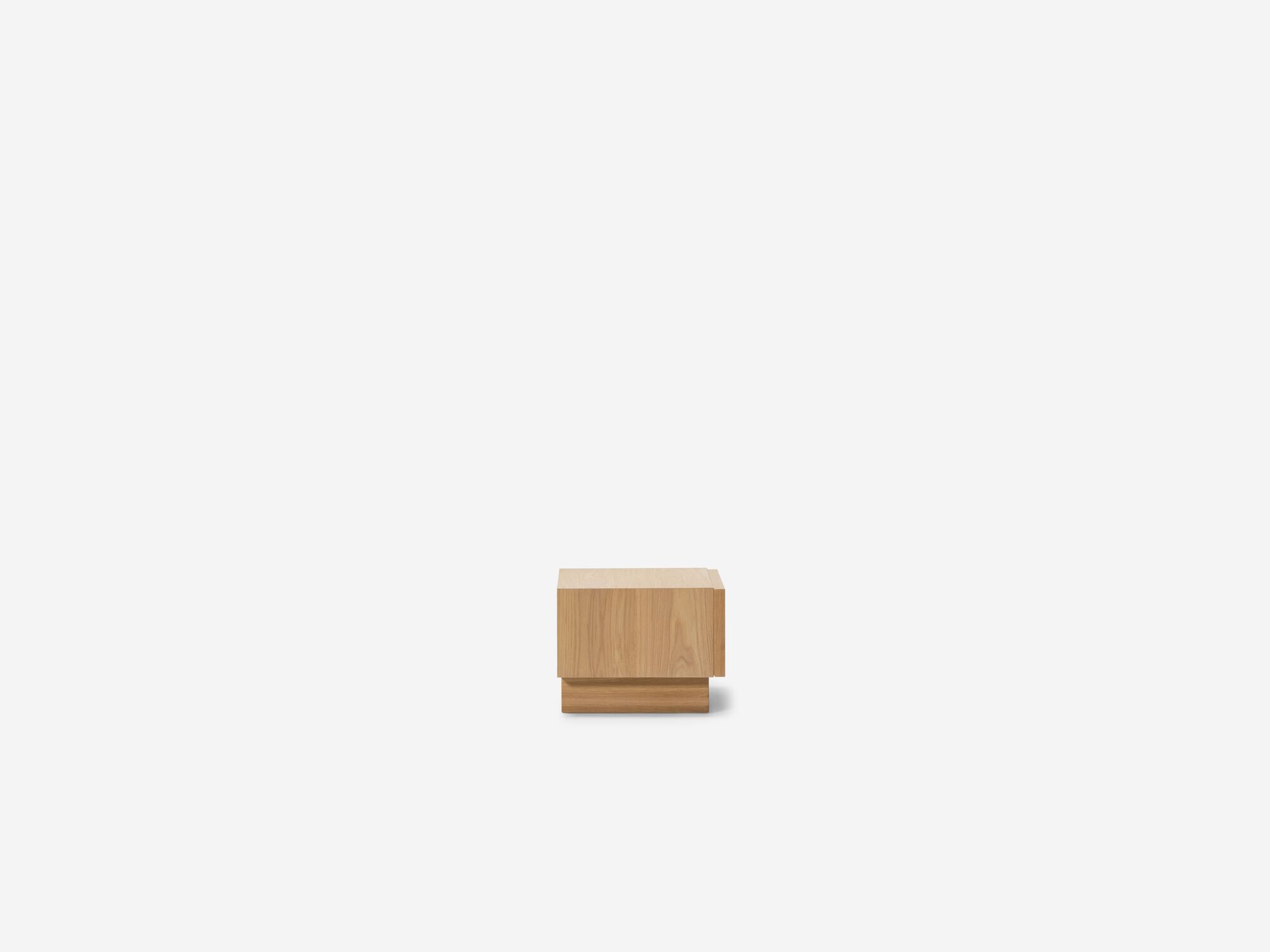 Oak nightstand with woven drawer fronts side view