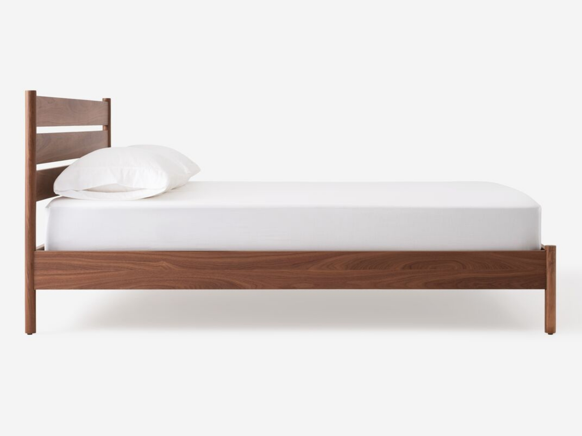 Side view of our modern walnut platform bed, Monarch