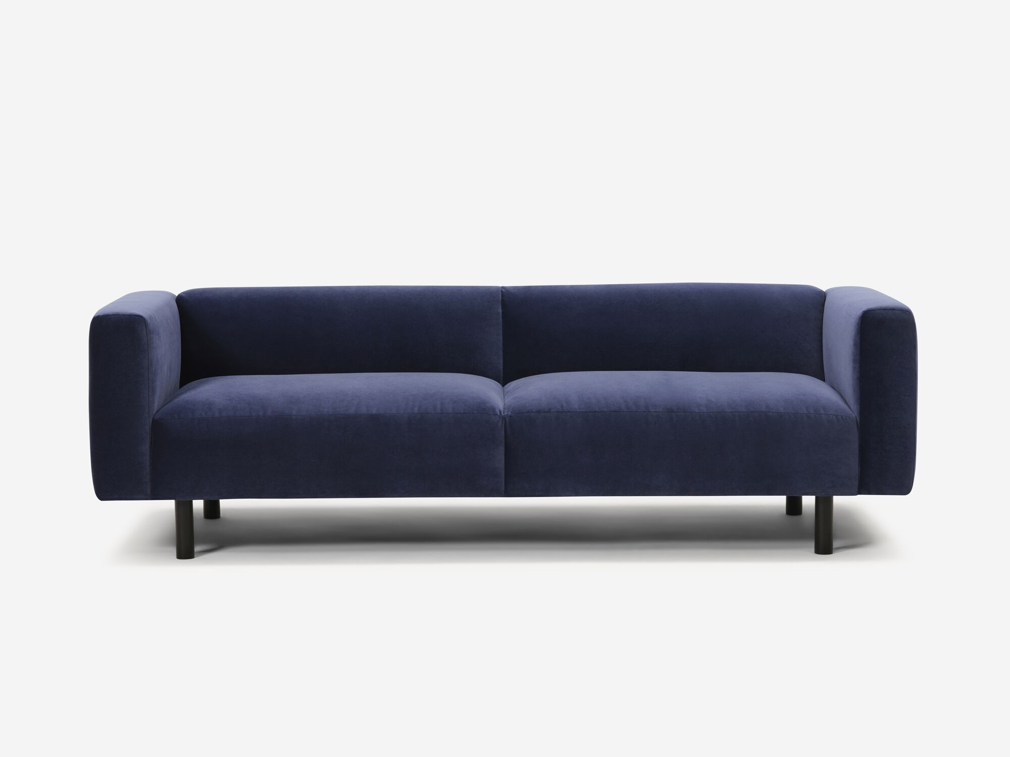 Blue velvet sofa front view