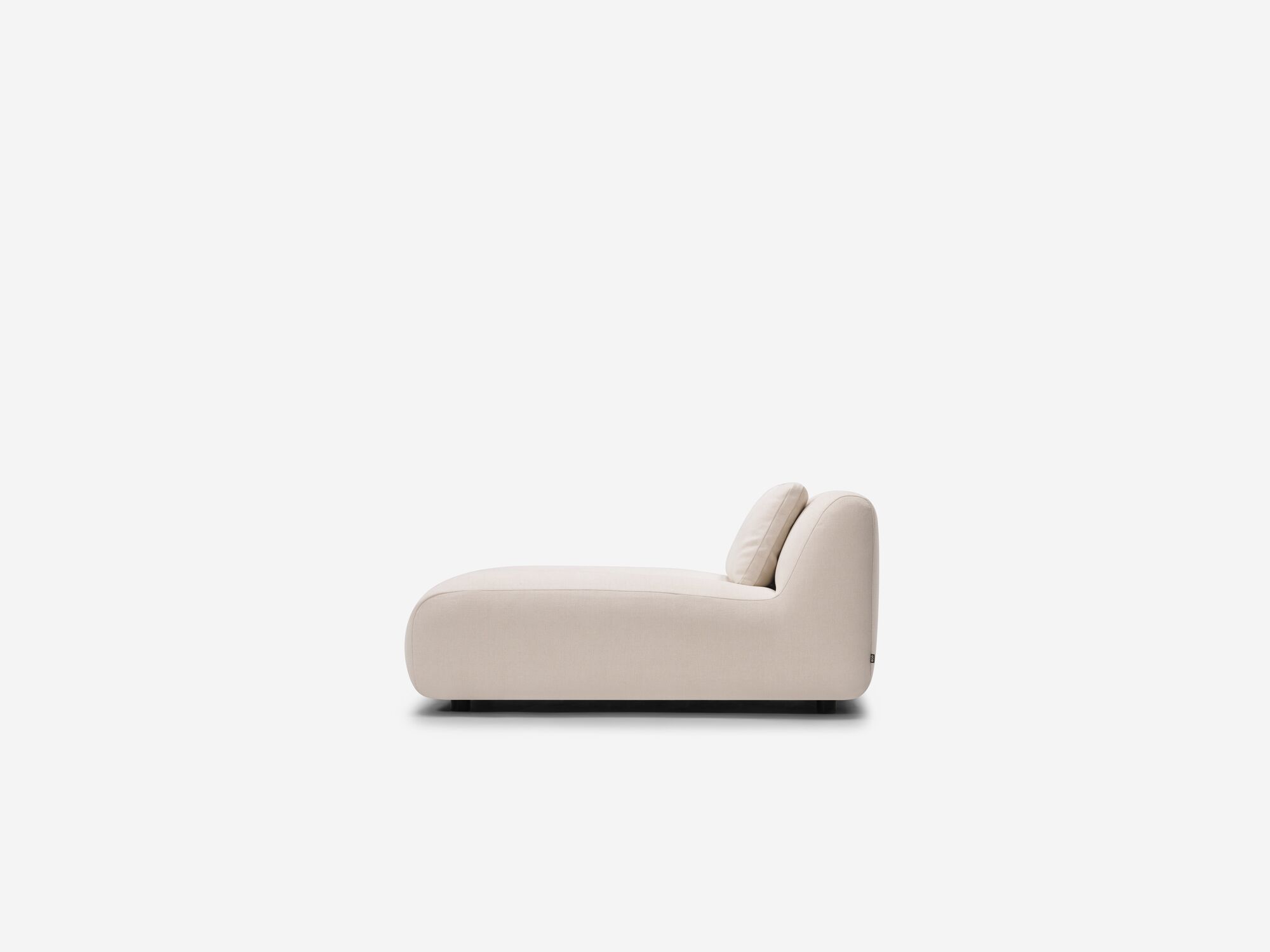 White armless chaise left side view