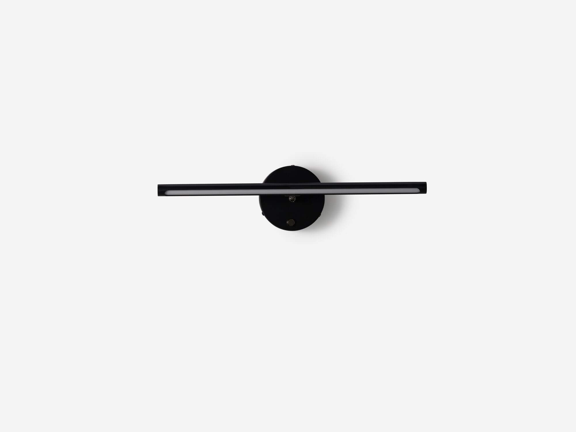 Front view of black slim wall lamp