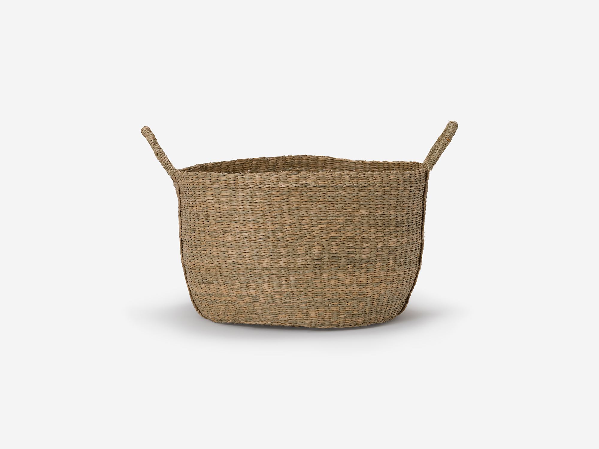 Side view of large natural woven basket with loops