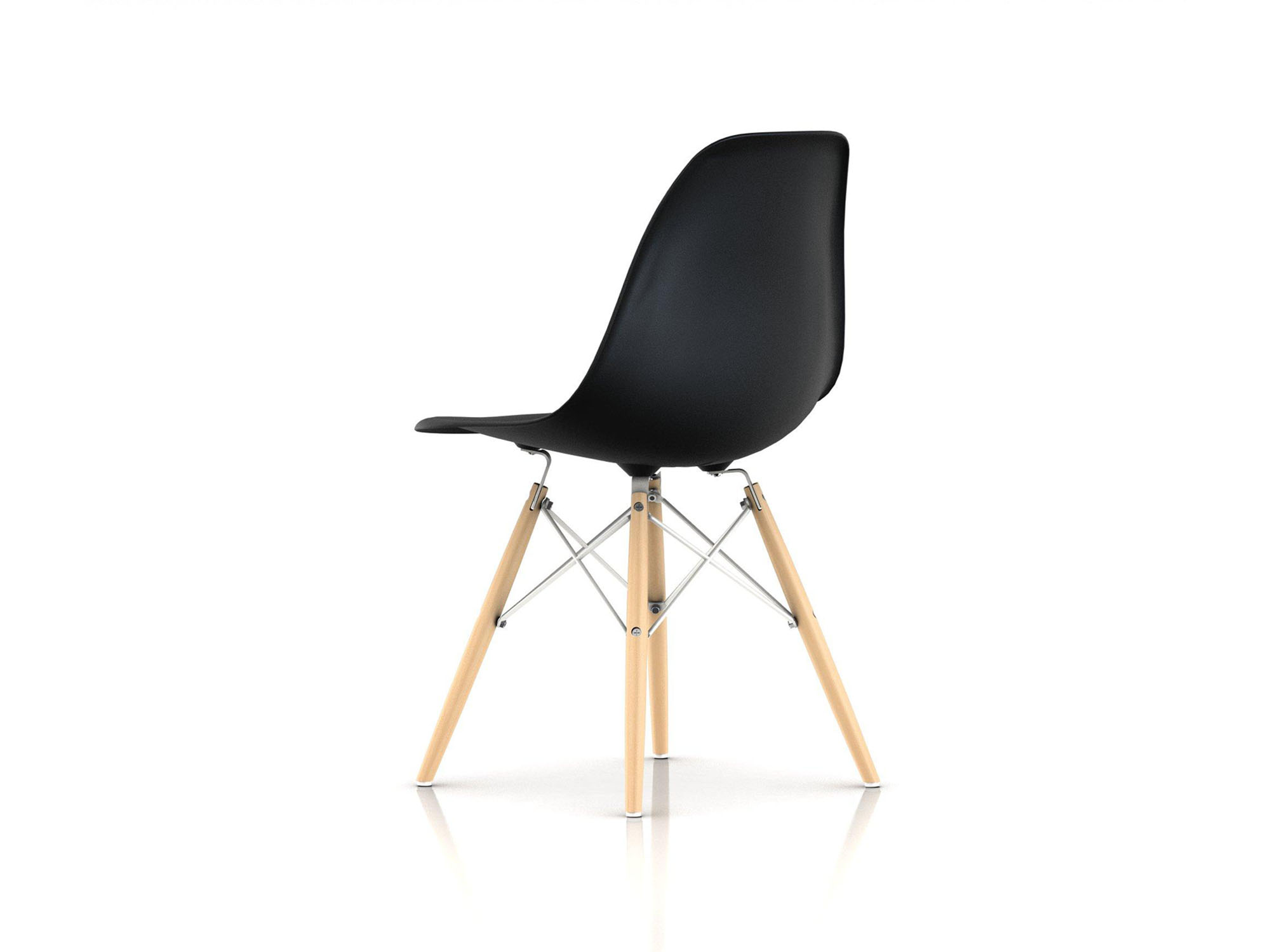 Back angle view of black chair with oak dowels and steel wire