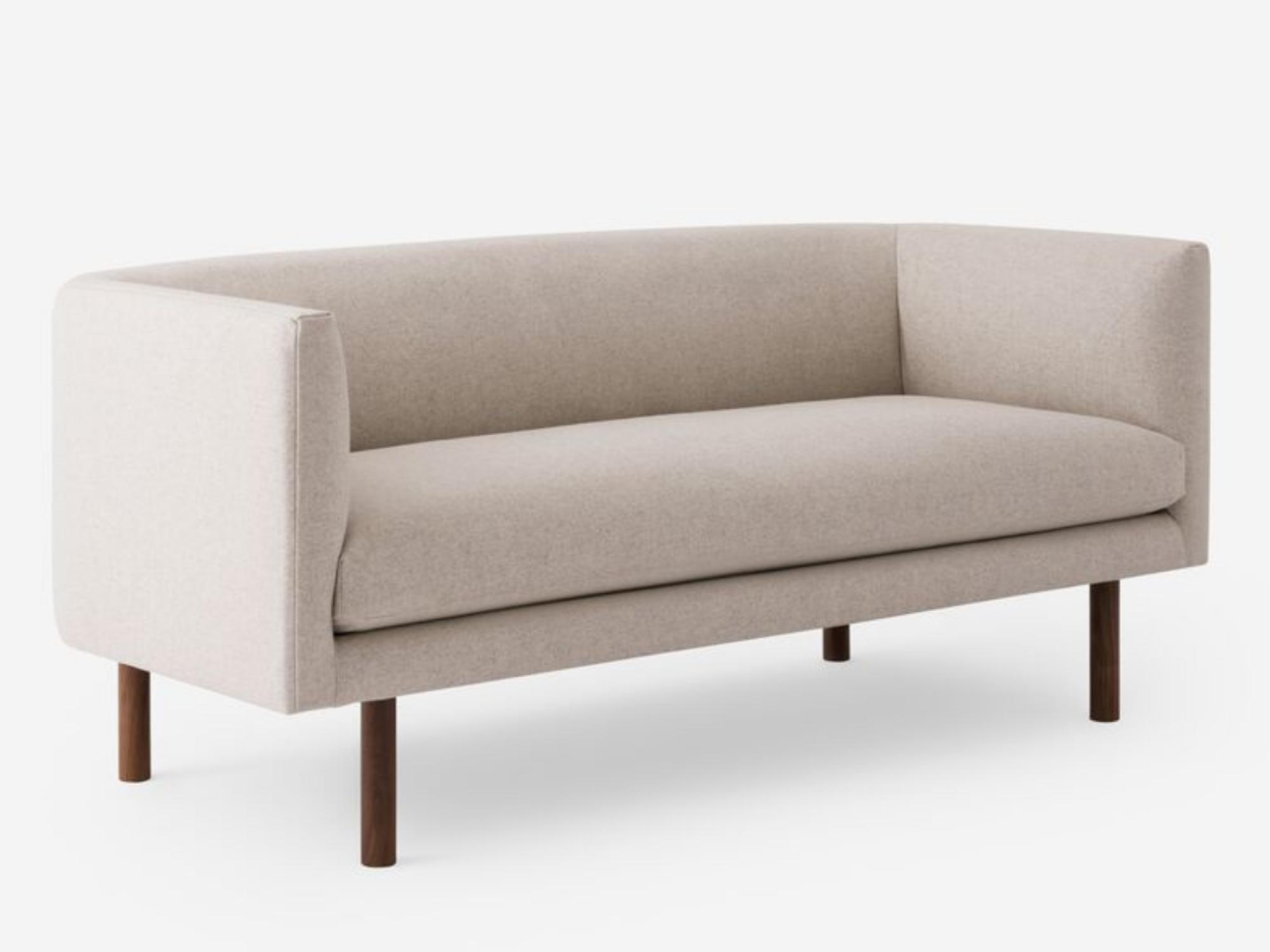 Angled view of the Replay modern club loveseat in white fabric