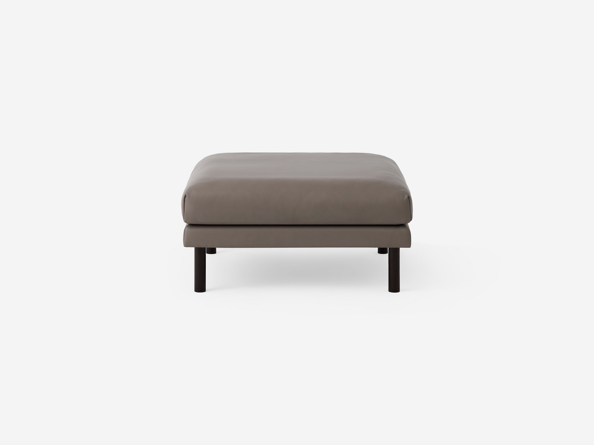 Front view of the Replay modern ottoman in gray leather