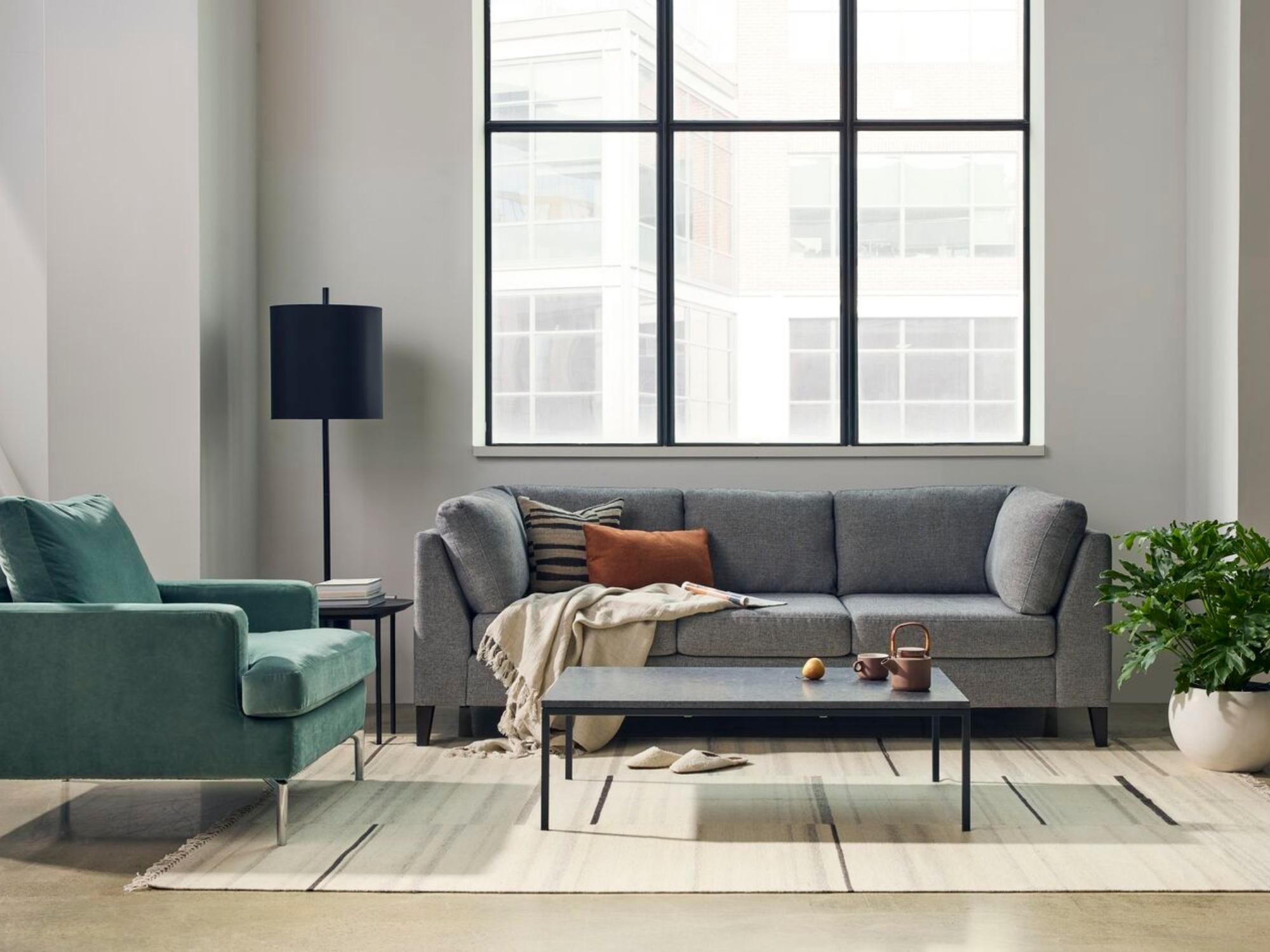 Striped beige area rug in large modern living room