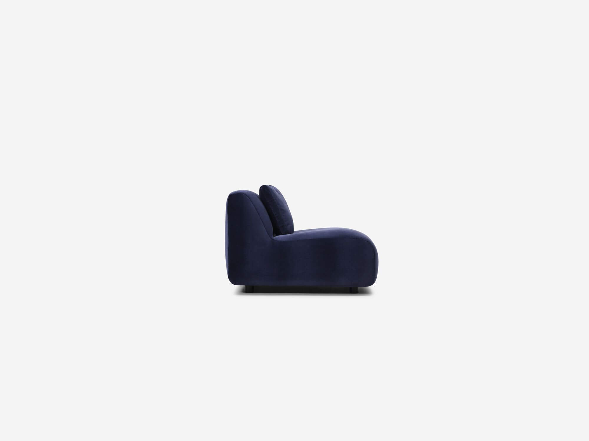 Left side view of blue velvet armless chair