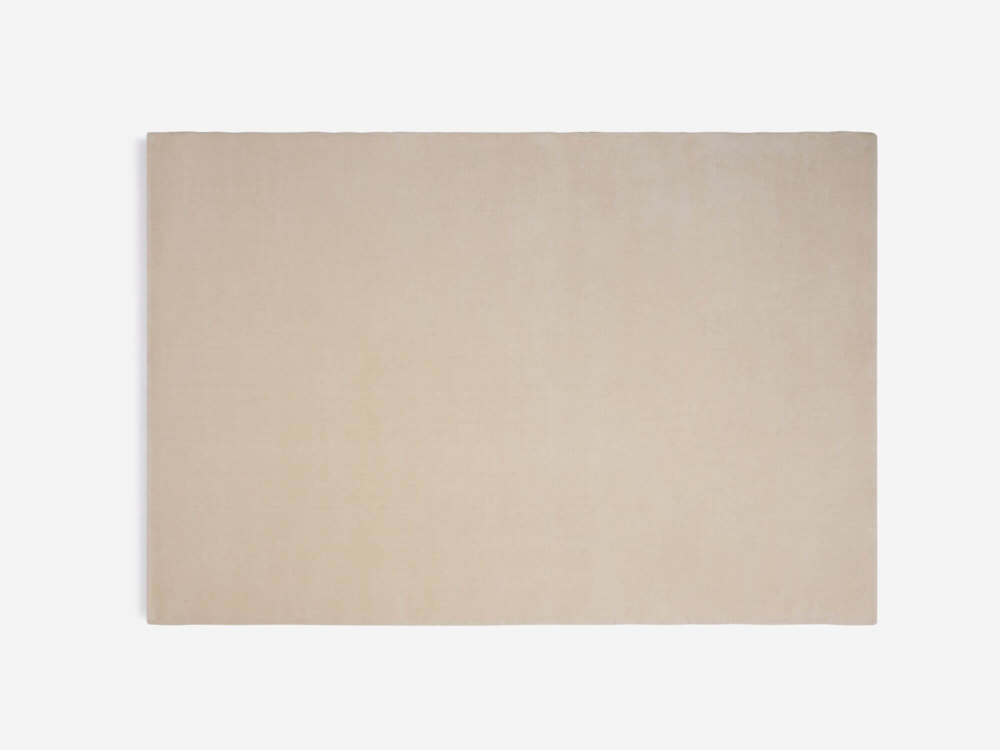 Top view of durable cream area rug