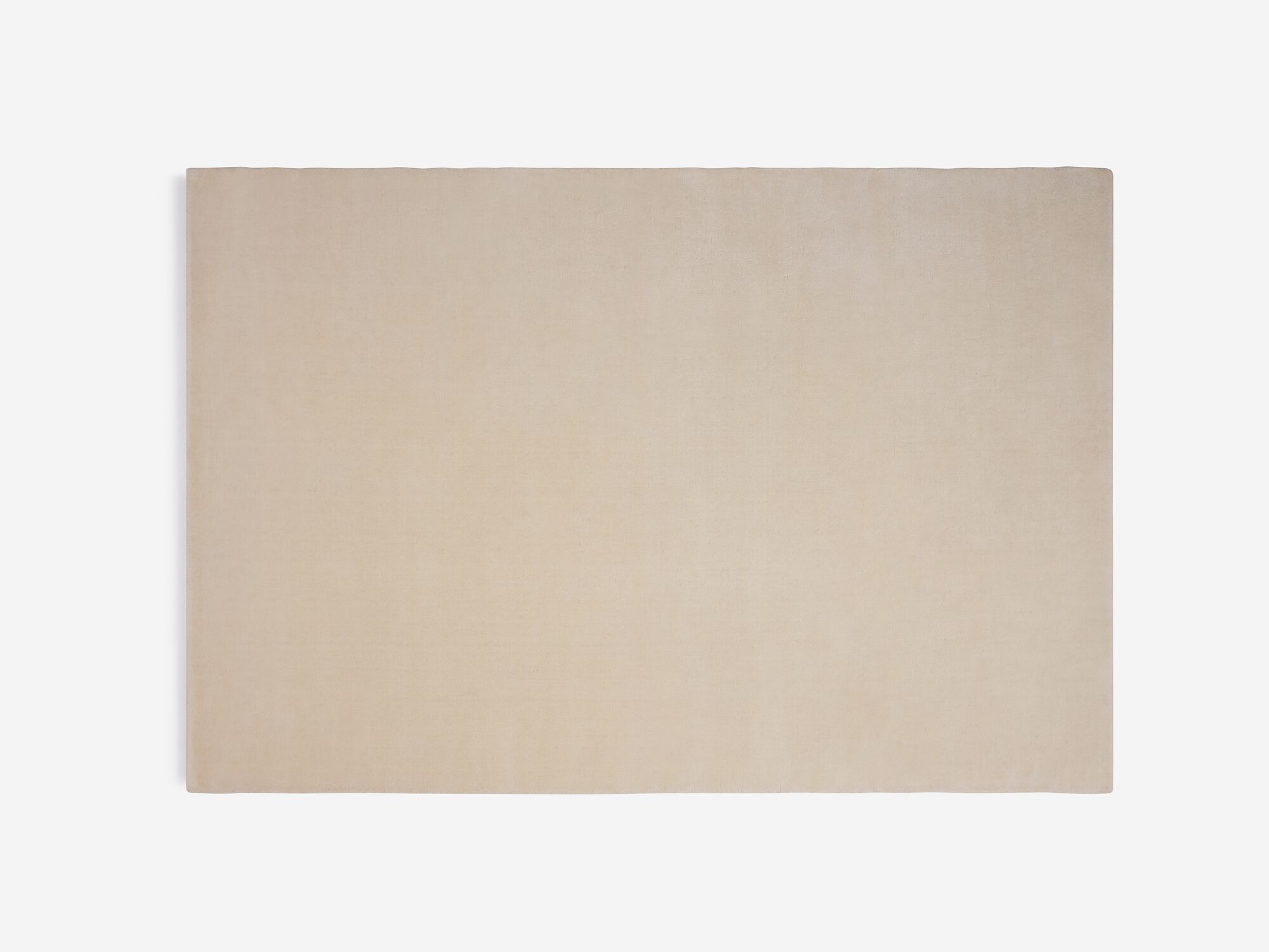 Top view of durable cream area rug