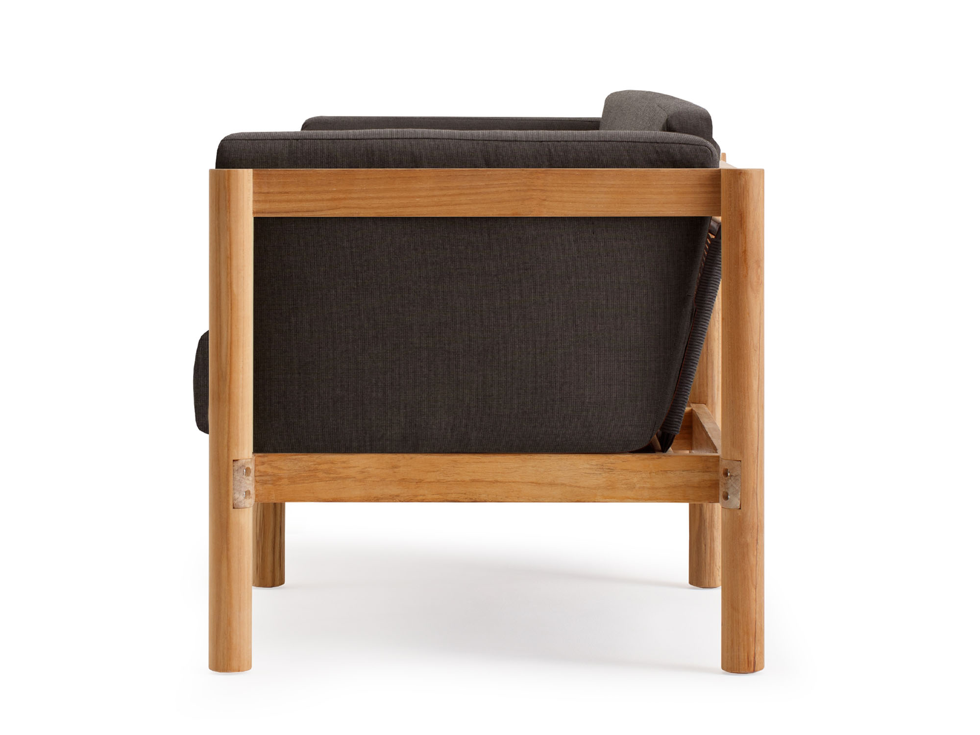 Side view of outdoor armchair with black cushions and wood legs