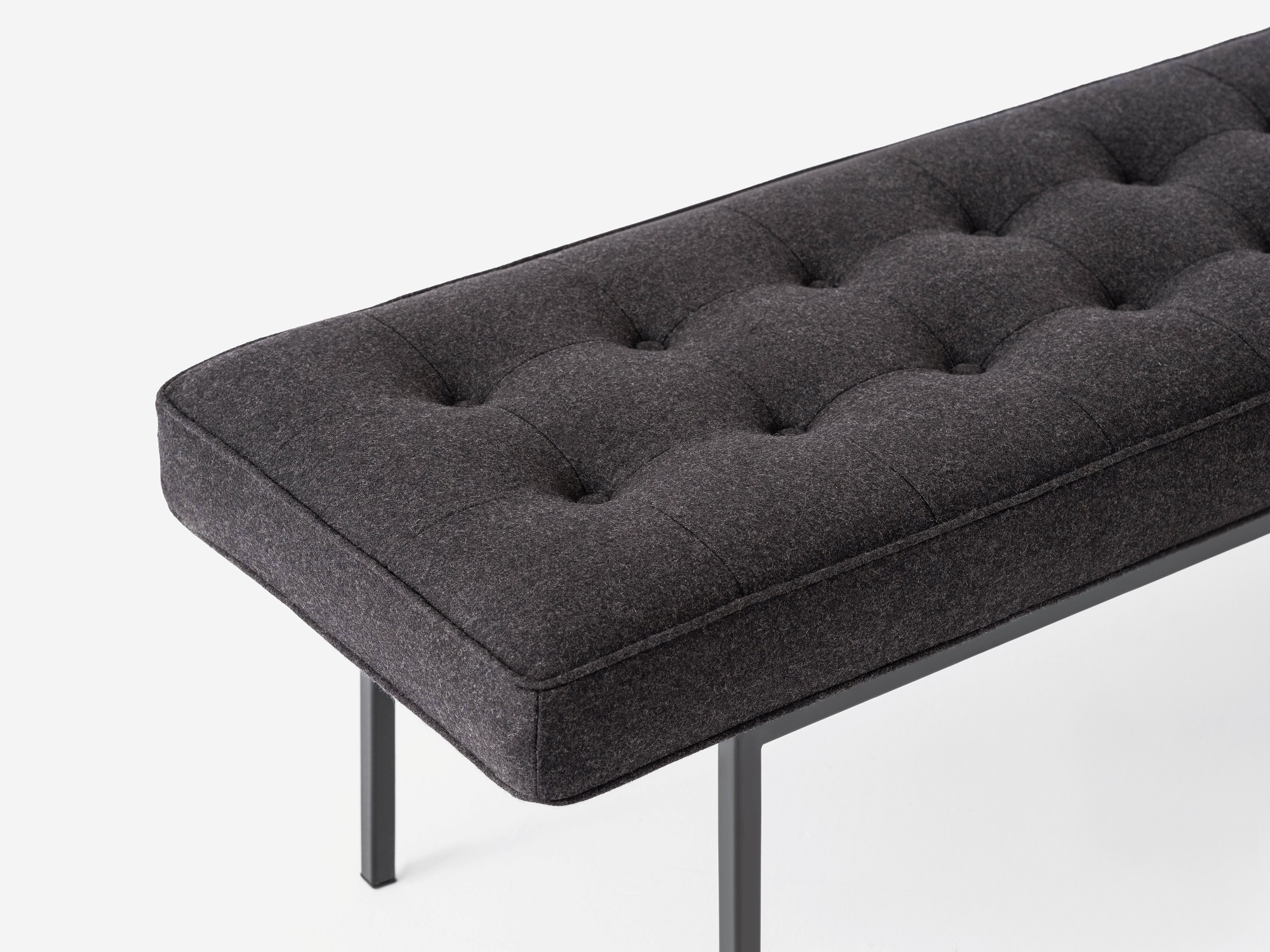 Detail view of the Bank mid century daybed in black fabric