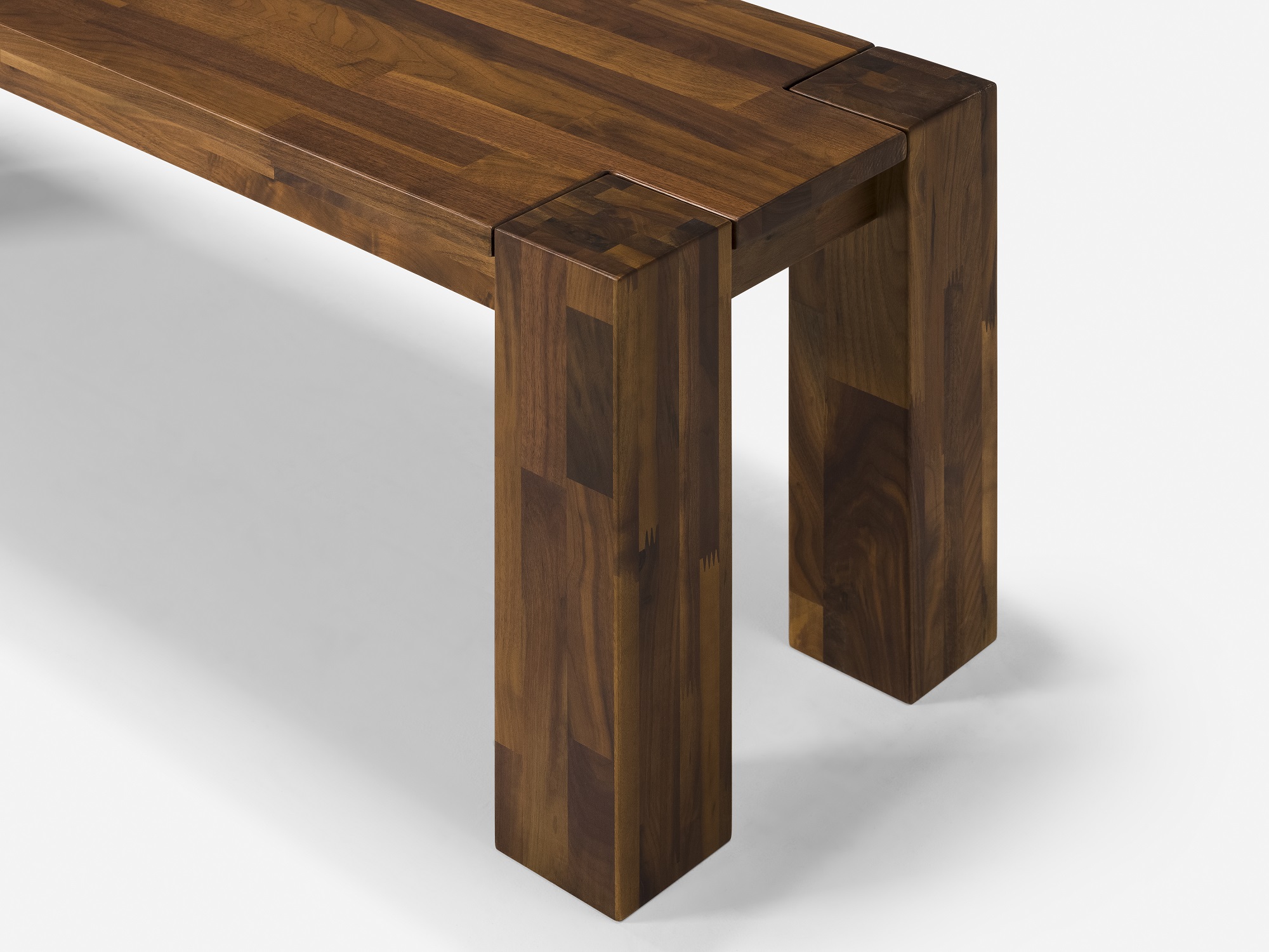 Detail view of small walnut Harvest modern dining bench