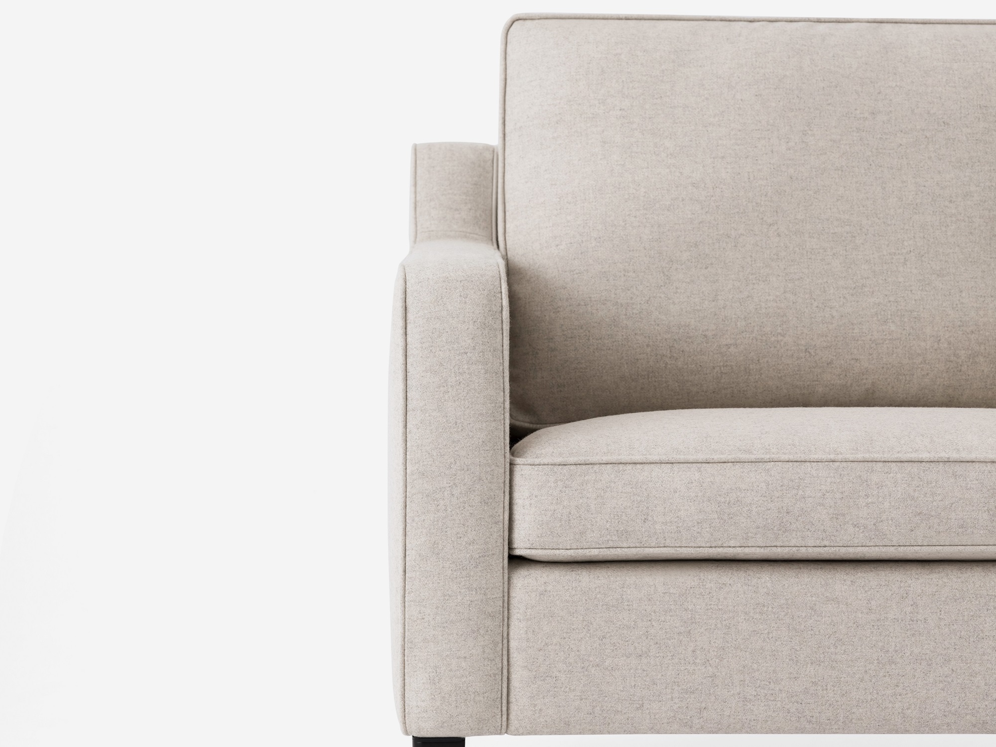 detail arm view of the Skye mid century modern armchair in beige fabric