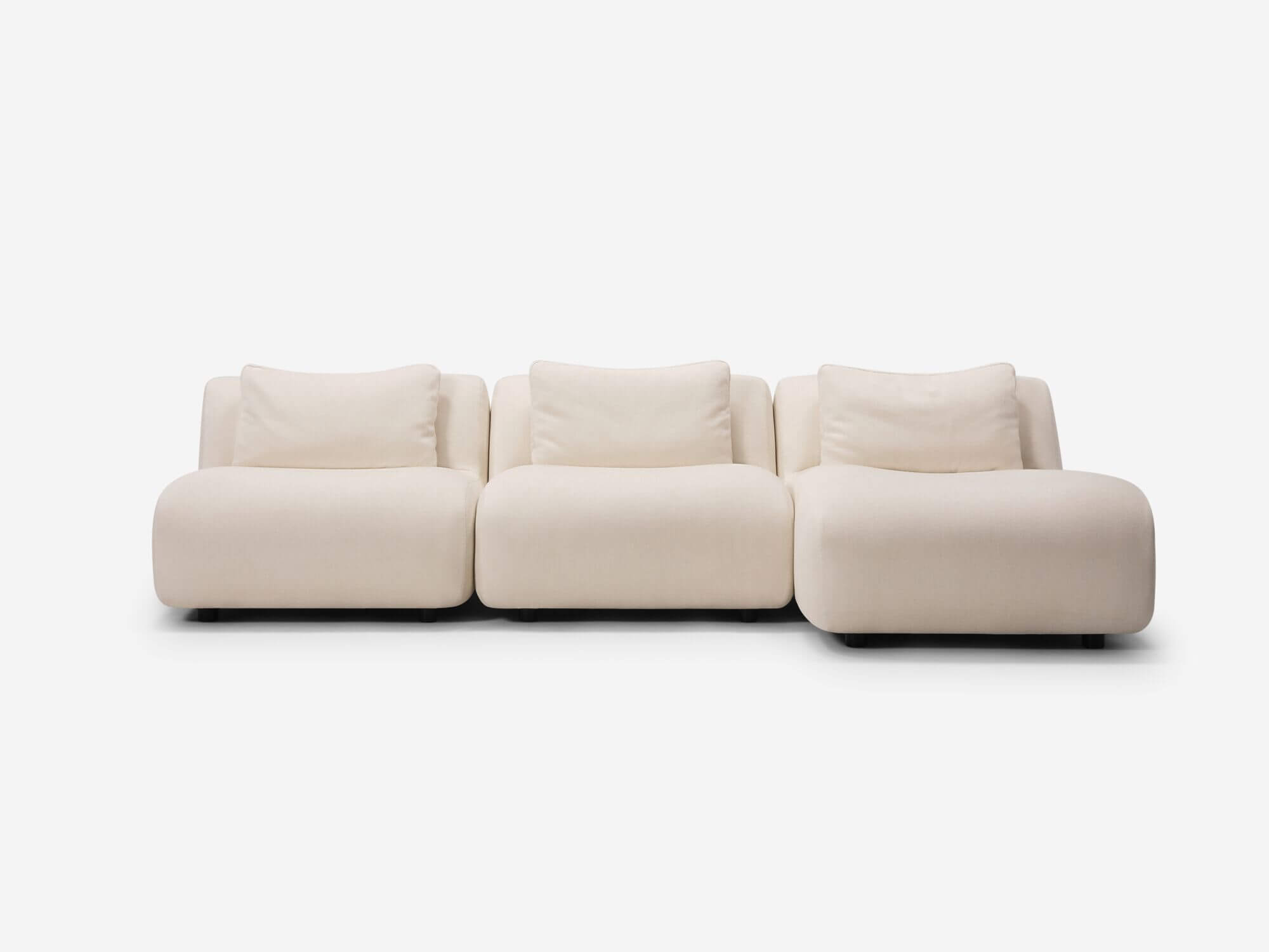 Front view of beige armless right hand facing sectional