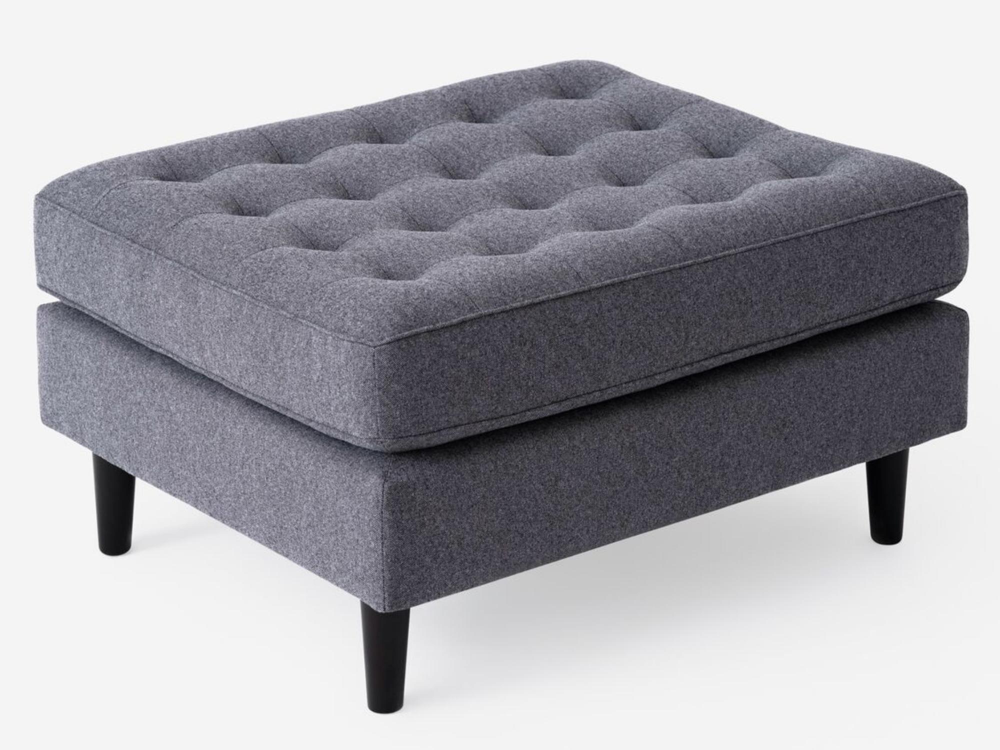 Detailed view of the black ash modern ottoman