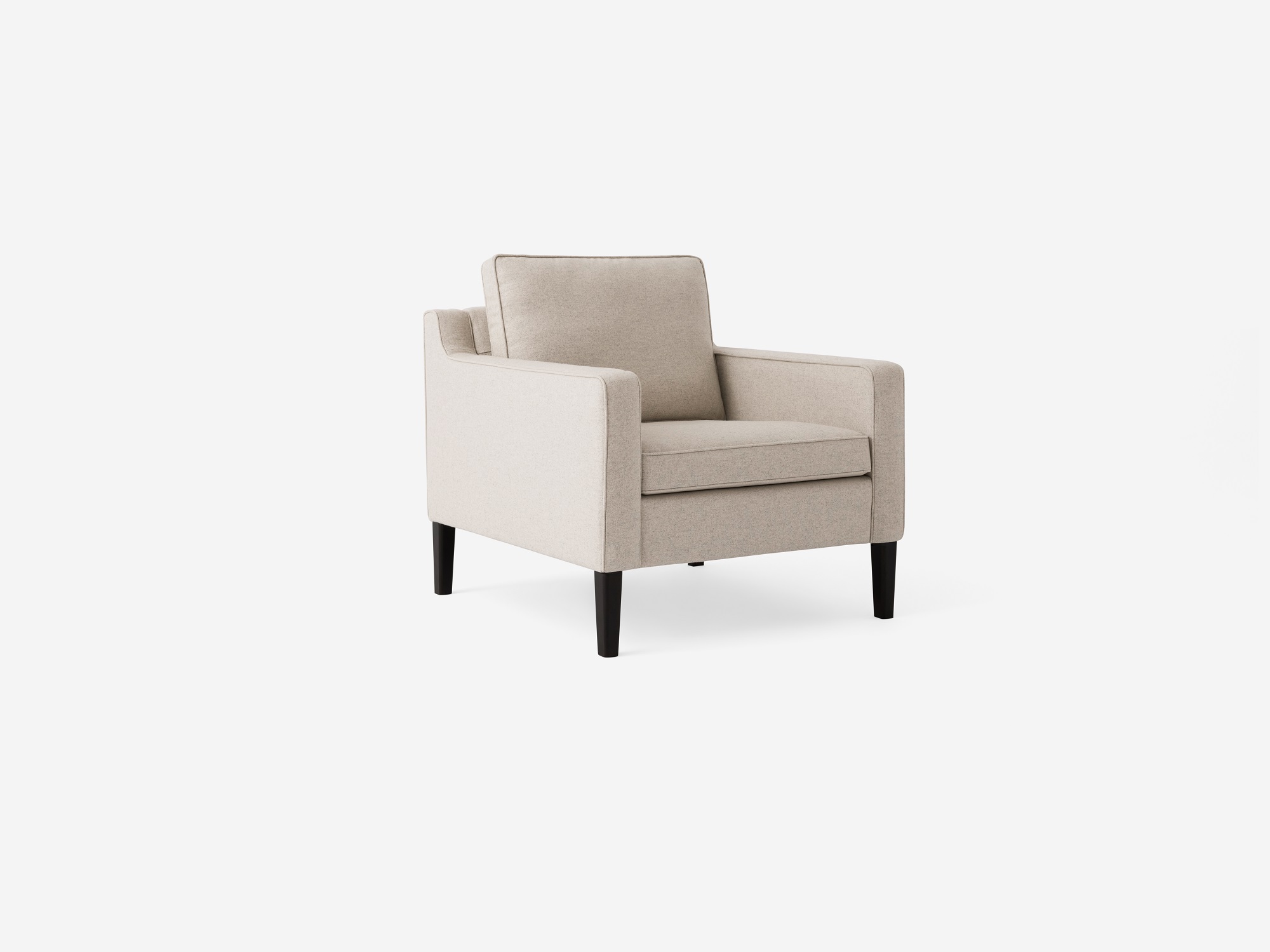 Angled view of the Skye mid century modern armchair in beige fabric