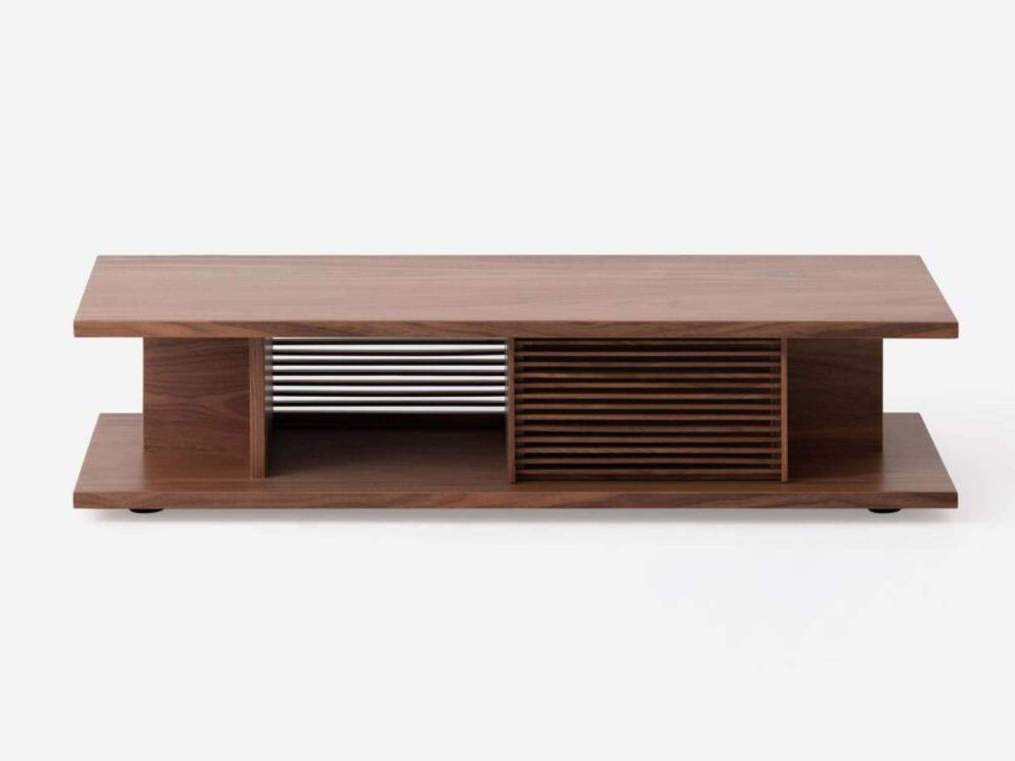 Front right view of the Plank minimalist coffee table in walnut with slats