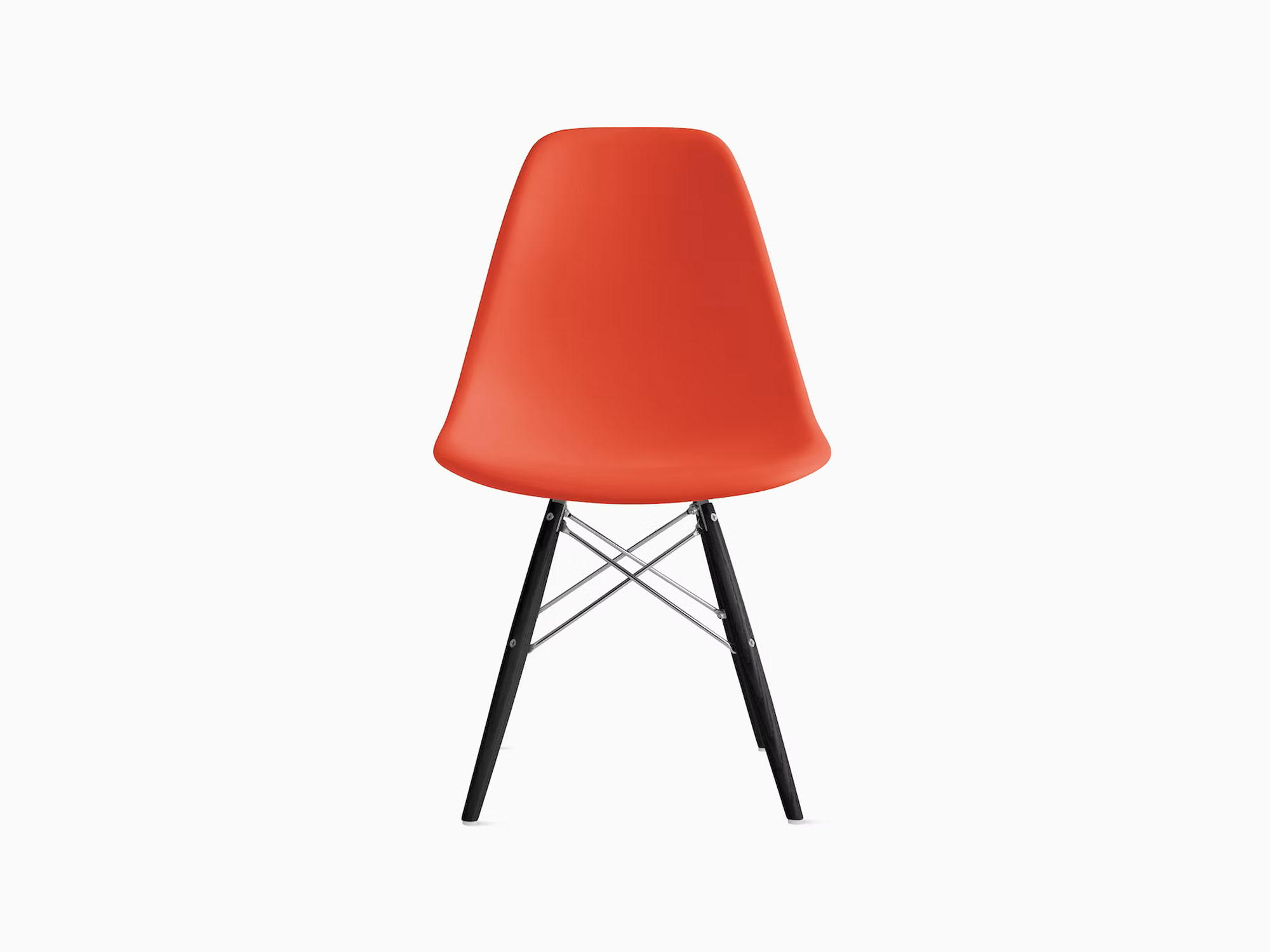 Front view of orange plastic chair with black dowels