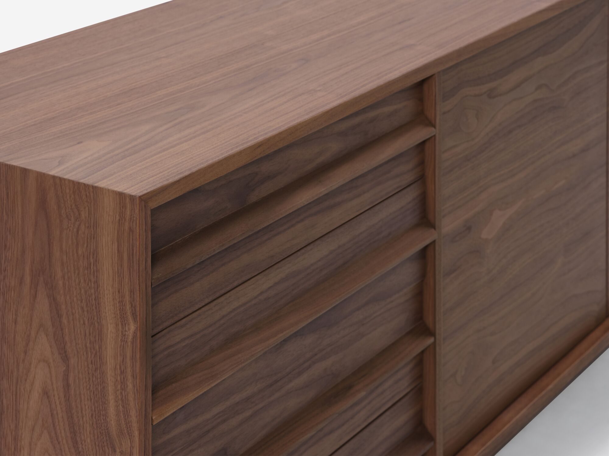 Closed drawer detail view of large walnut mid century floating sideboard