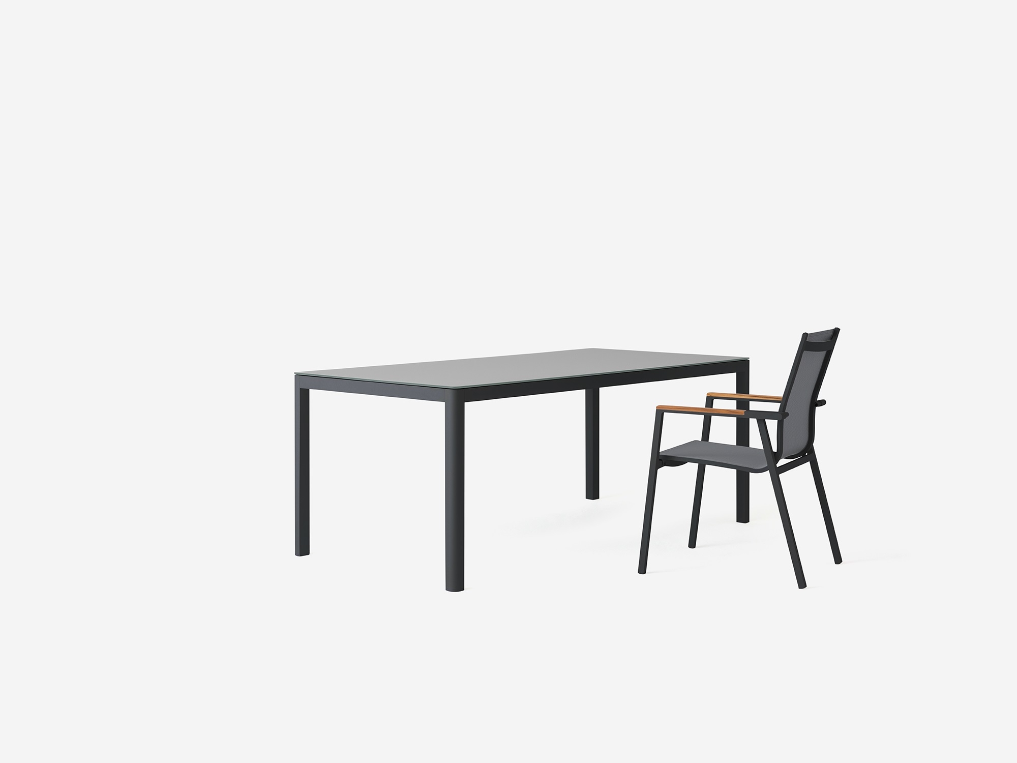 The Cape charcoal outdoor dining table with a Cape patio dining chair