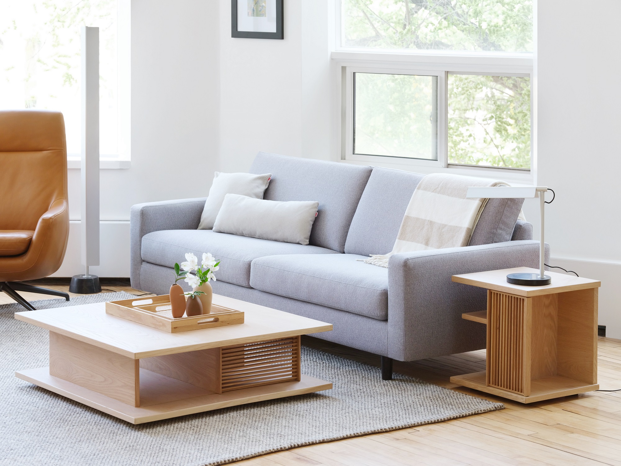 Oak side table and coffee table in apartment living room