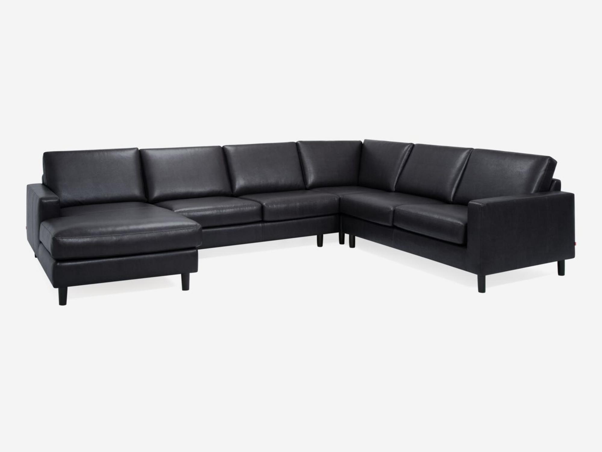 Angled view of the Oskar 4-piece modern sectional sofa in black leather