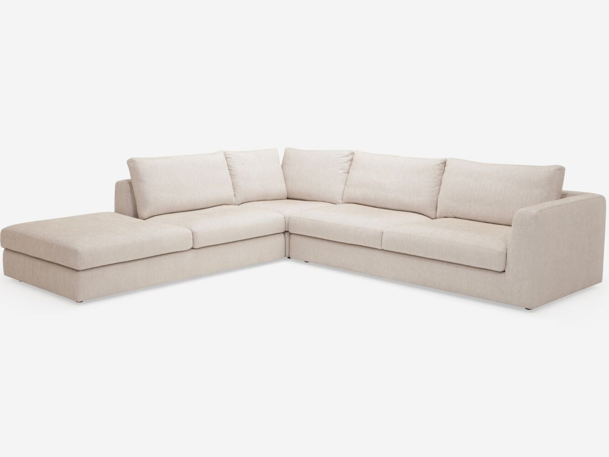 Front view of the Cello modern sectional couch in white fabric with left hand backless chaise