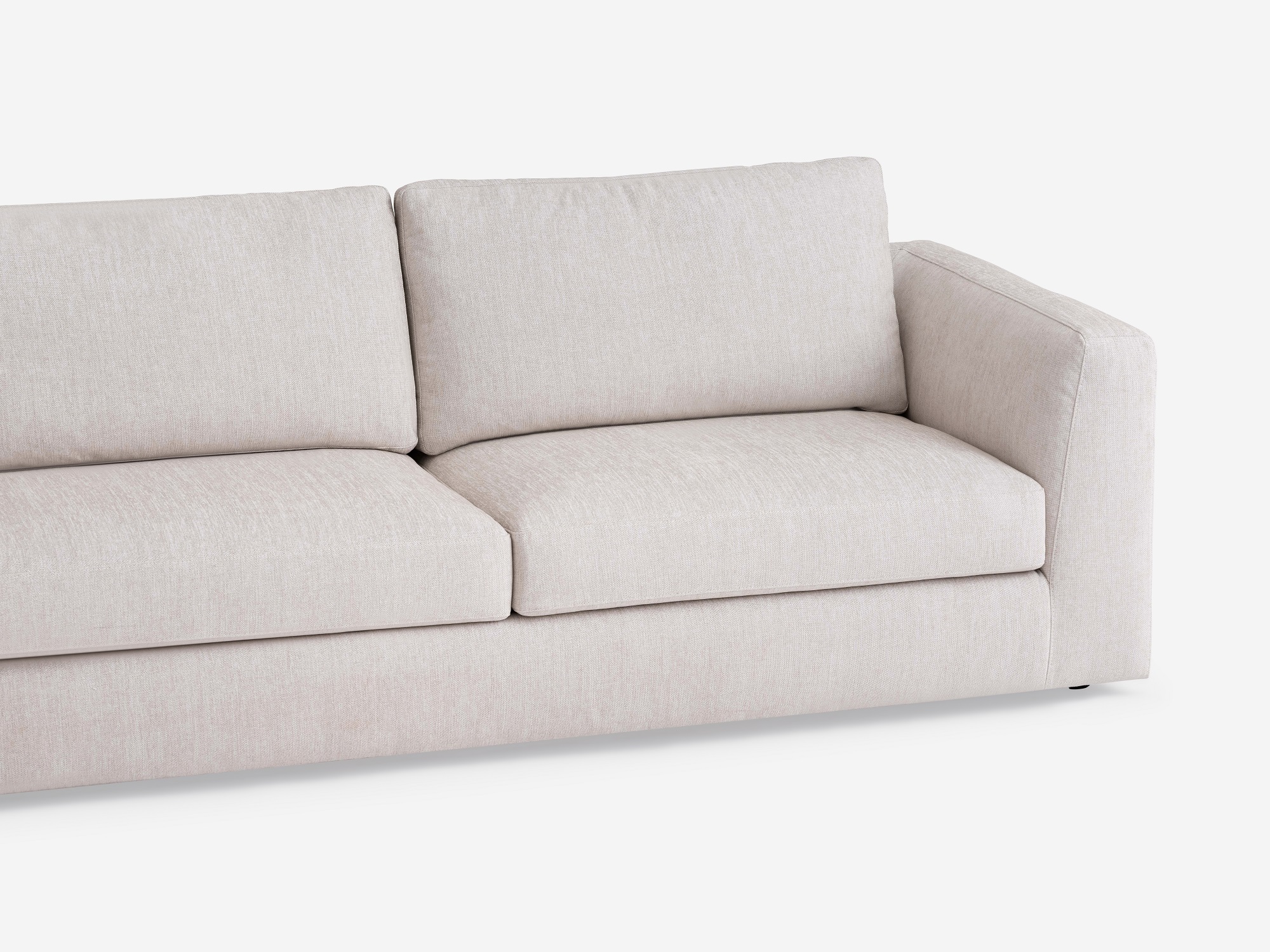 Detail seat view of the Cello modular sofa in white fabric left hand facing