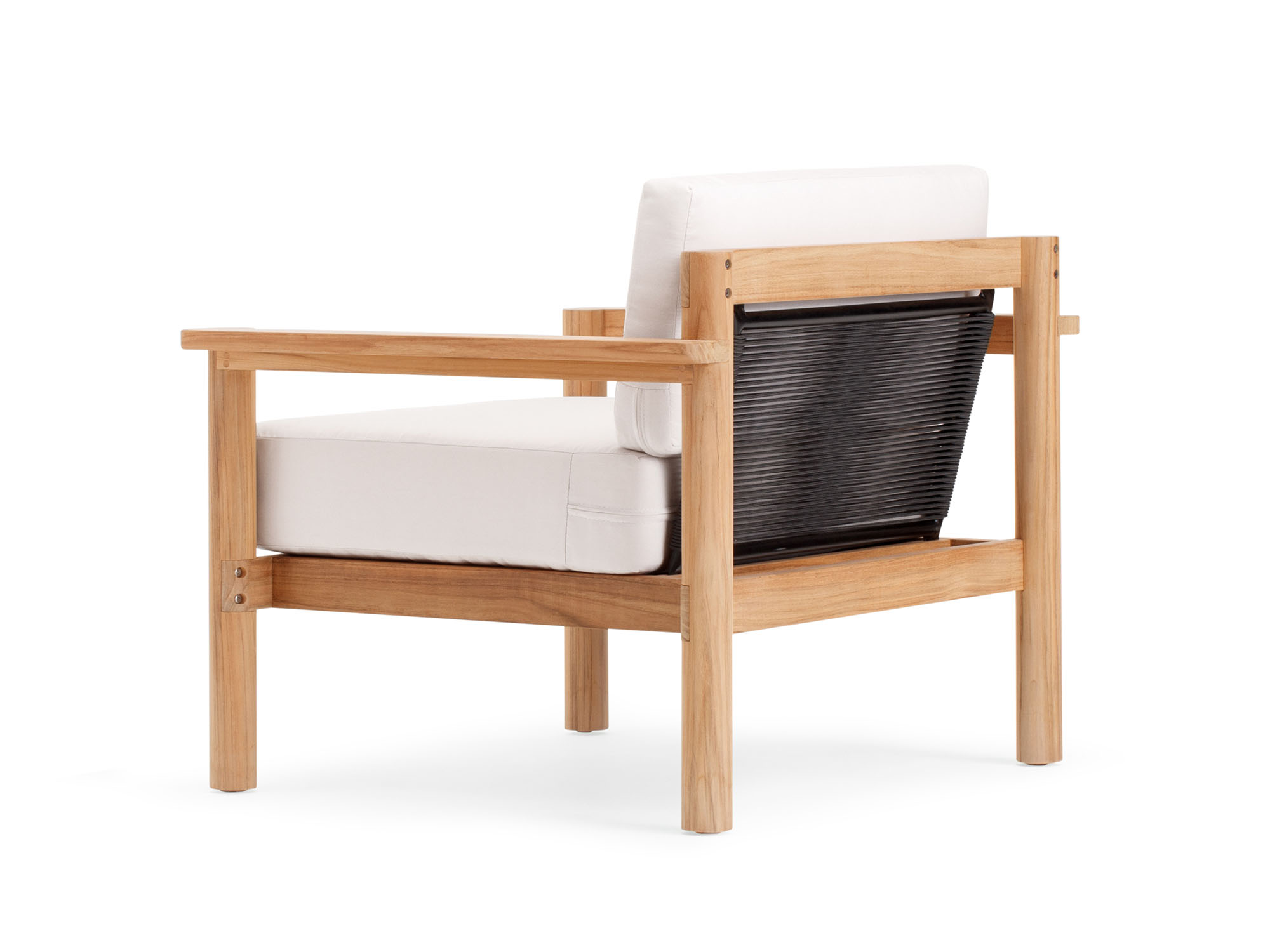 Back angle view of outdoor chair with white cushions and wood legs