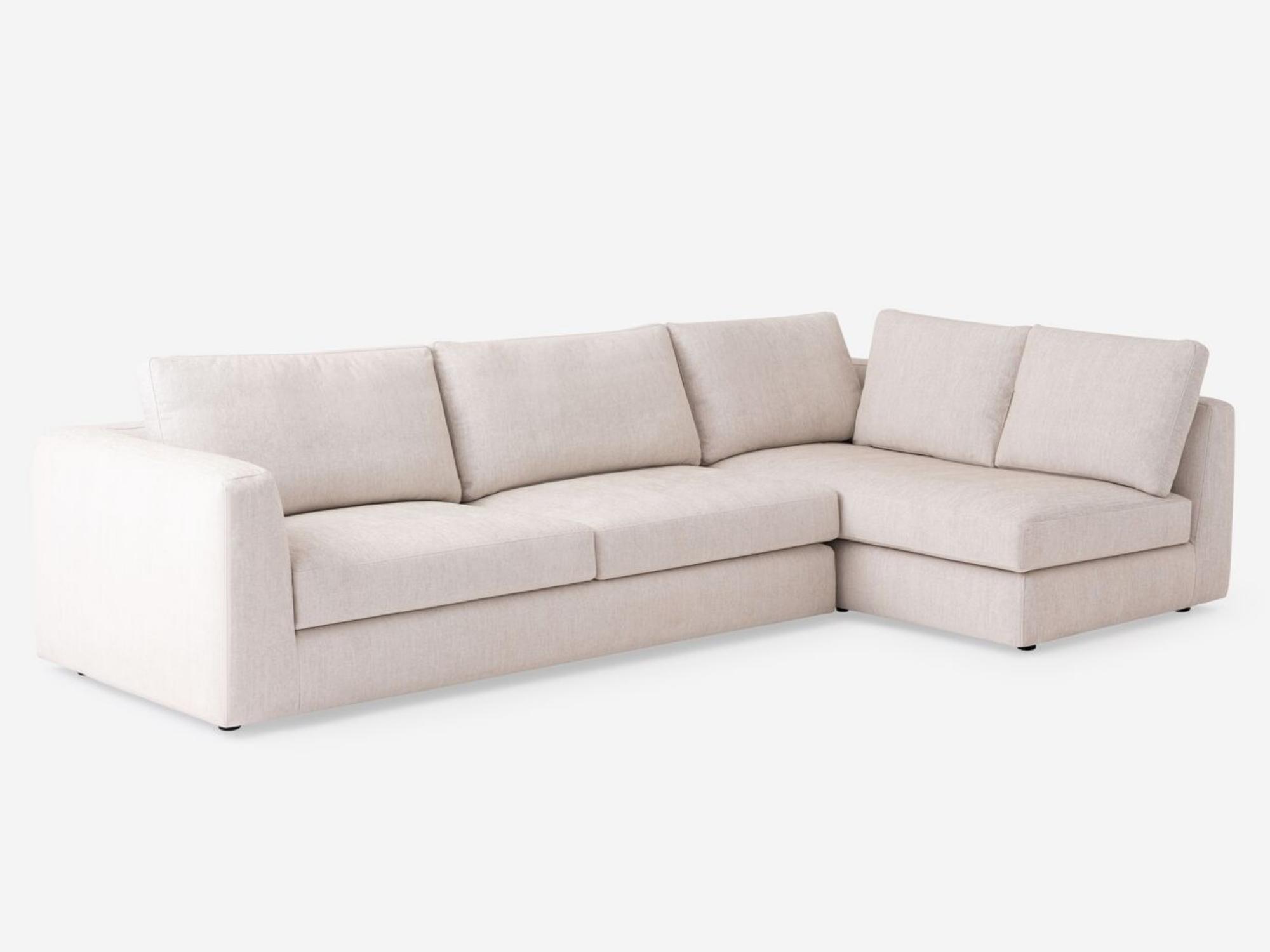 Angled view of the Cello modular sofa in white fabric