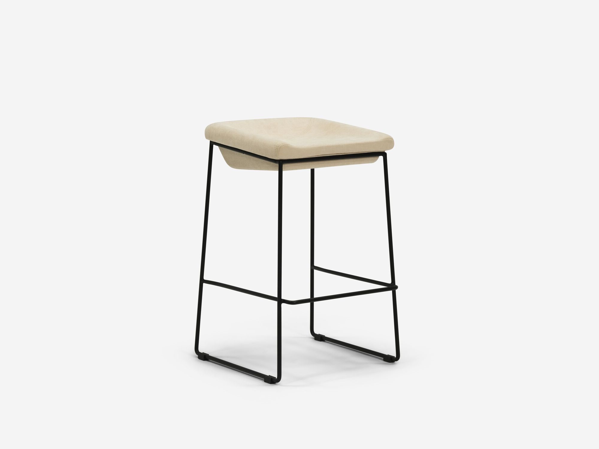 Counter stool with beige seat and black legs front angle view