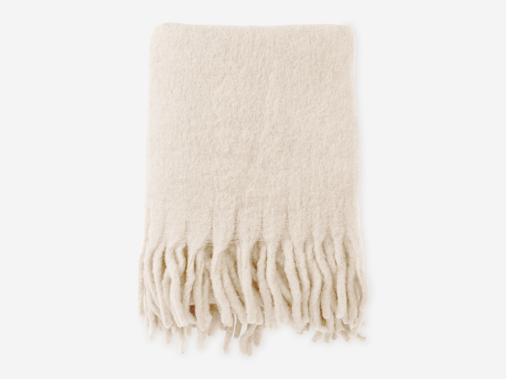 Top view of folded ivory wool throw