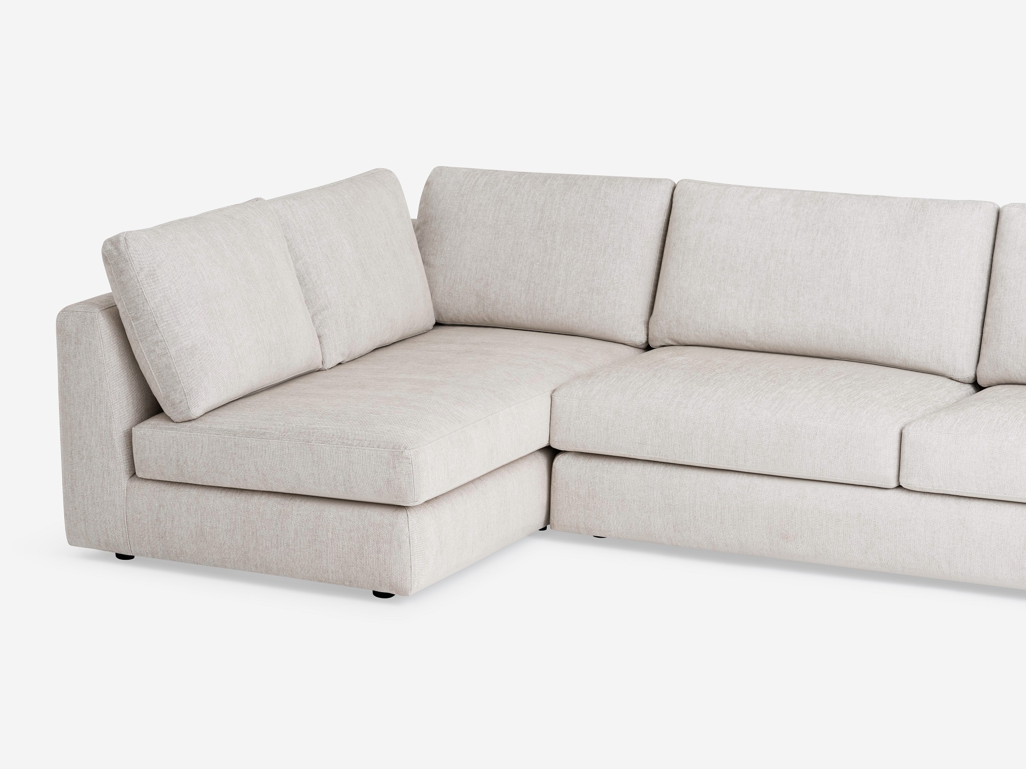 Detail view of the Cello modular sofa in white fabric chaise left hand facing