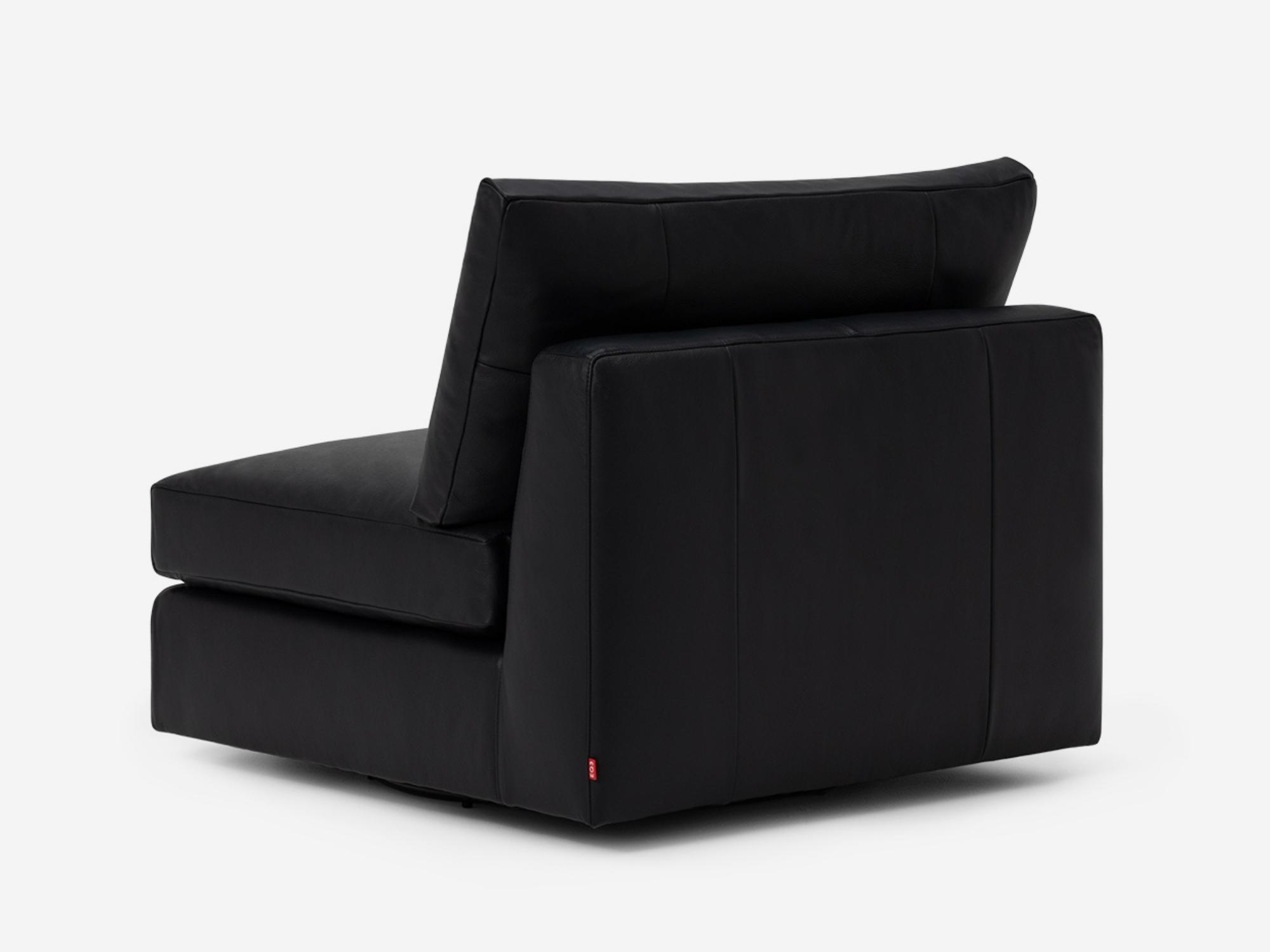 Back angle view of black leather armless chair