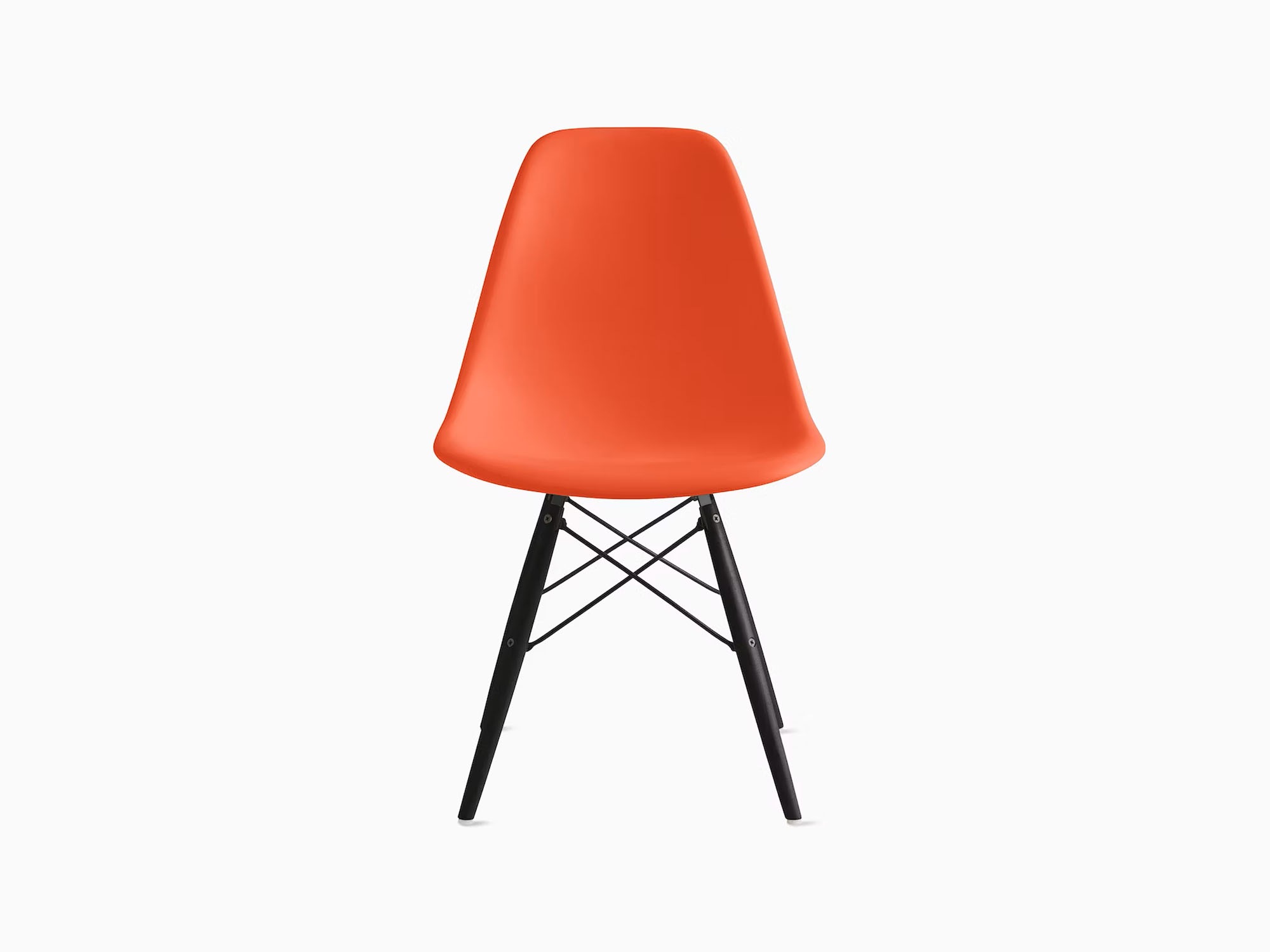 Front view of orange plastic chair with ebony dowels